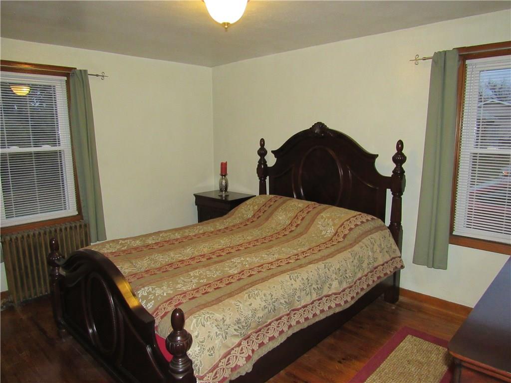 615 Unity Street Latrobe, PA 15650 - Photo 10 of 24 Master bedroom with new windows and real hardwood floors