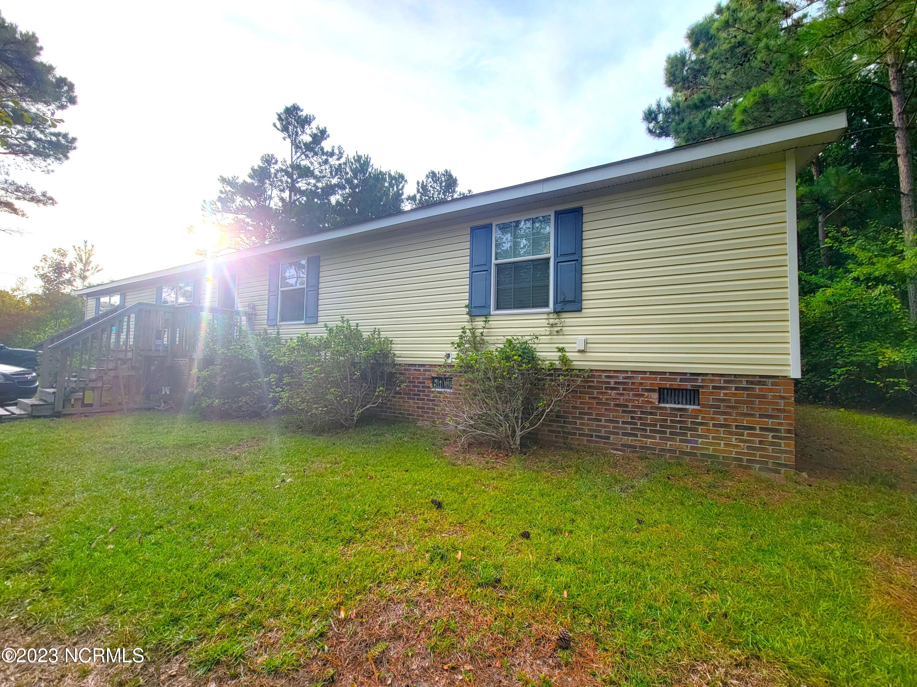 62 Shelley Road Hampstead, NC 28443 - Photo 2 of 3 Front 1