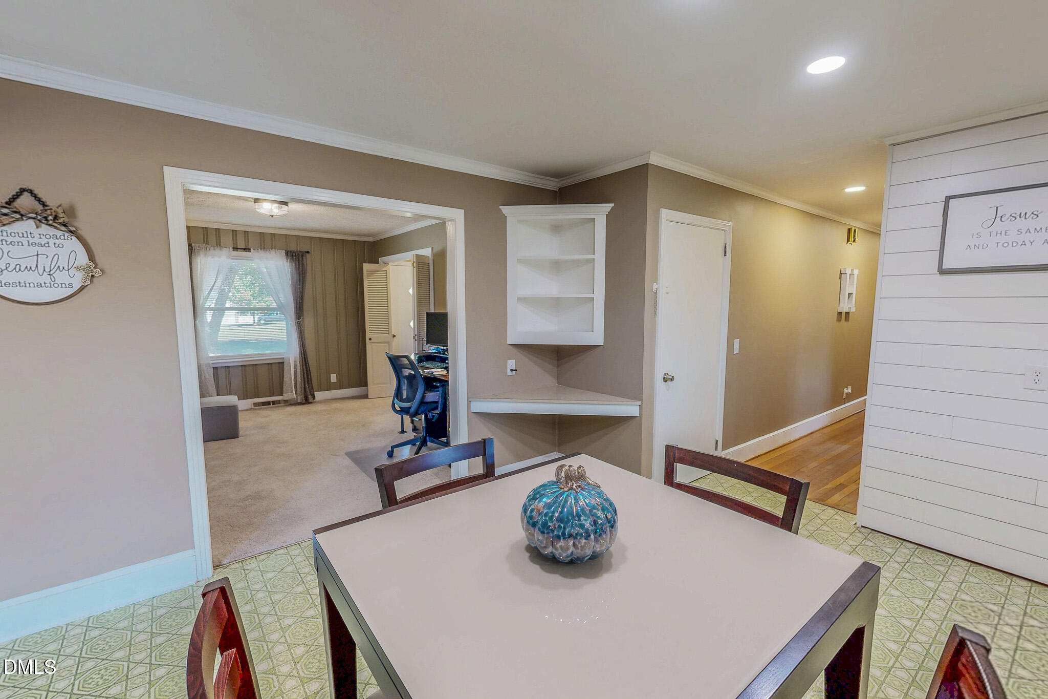12057 Hurdle Mills Road Hurdle Mills, NC 27541 - Photo 20 of 52 a dining room with furniture and wooden floor