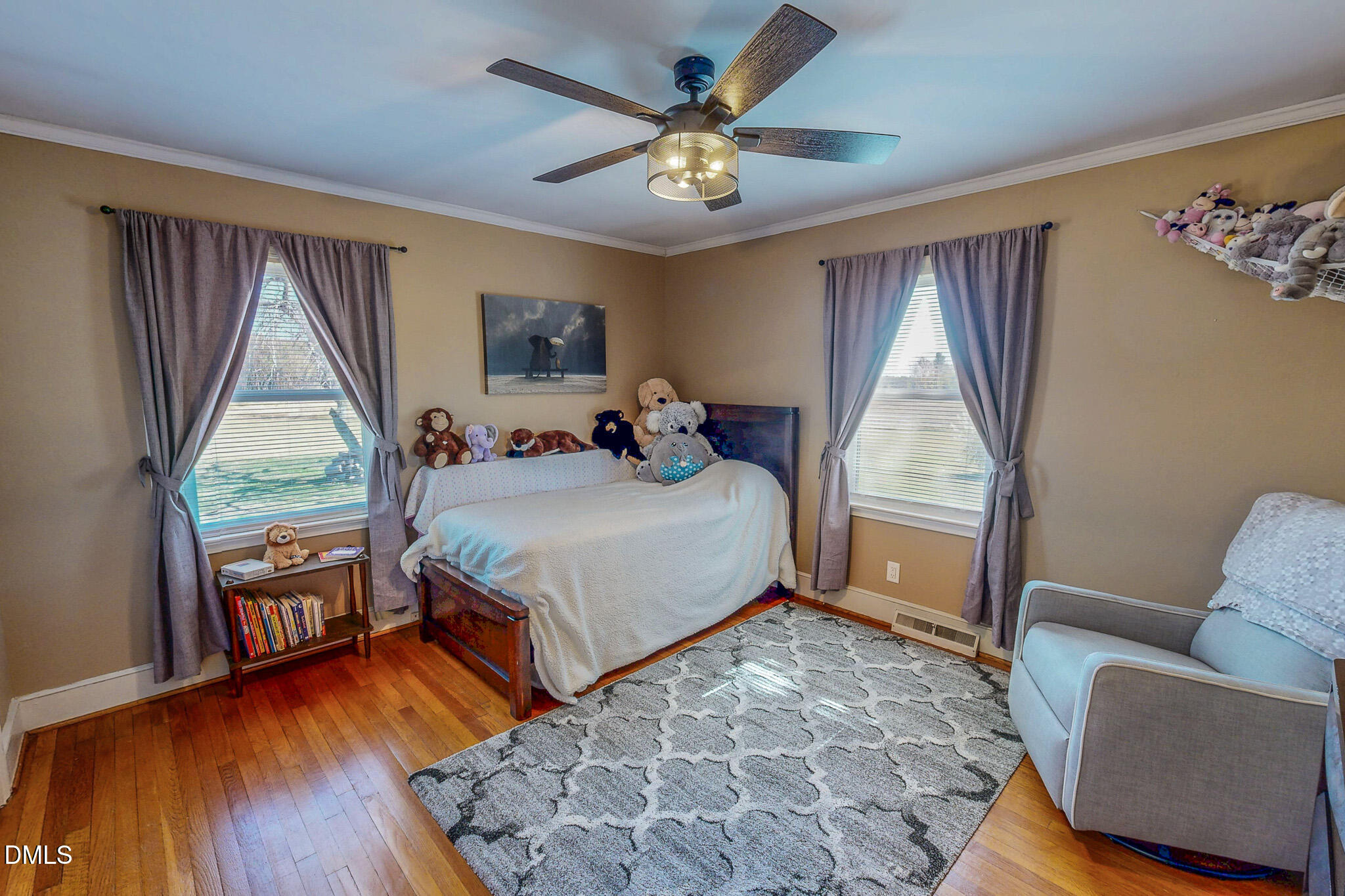 12057 Hurdle Mills Road Hurdle Mills, NC 27541 - Photo 35 of 52 a bedroom with a bed and a couch