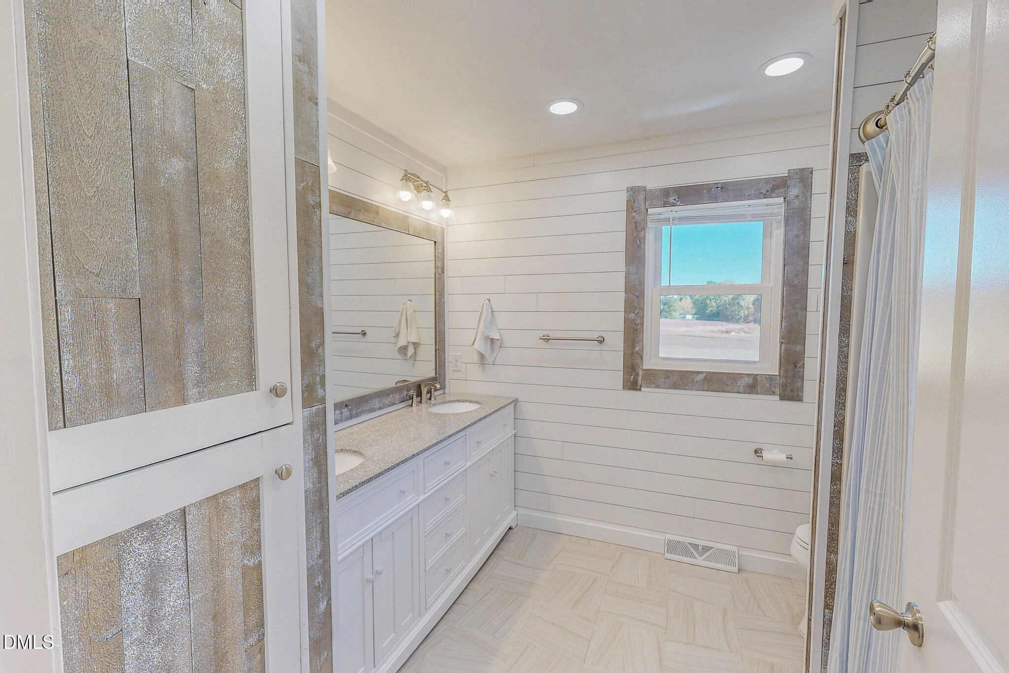 12057 Hurdle Mills Road Hurdle Mills, NC 27541 - Photo 37 of 52 a bathroom with a bathtub and a sink