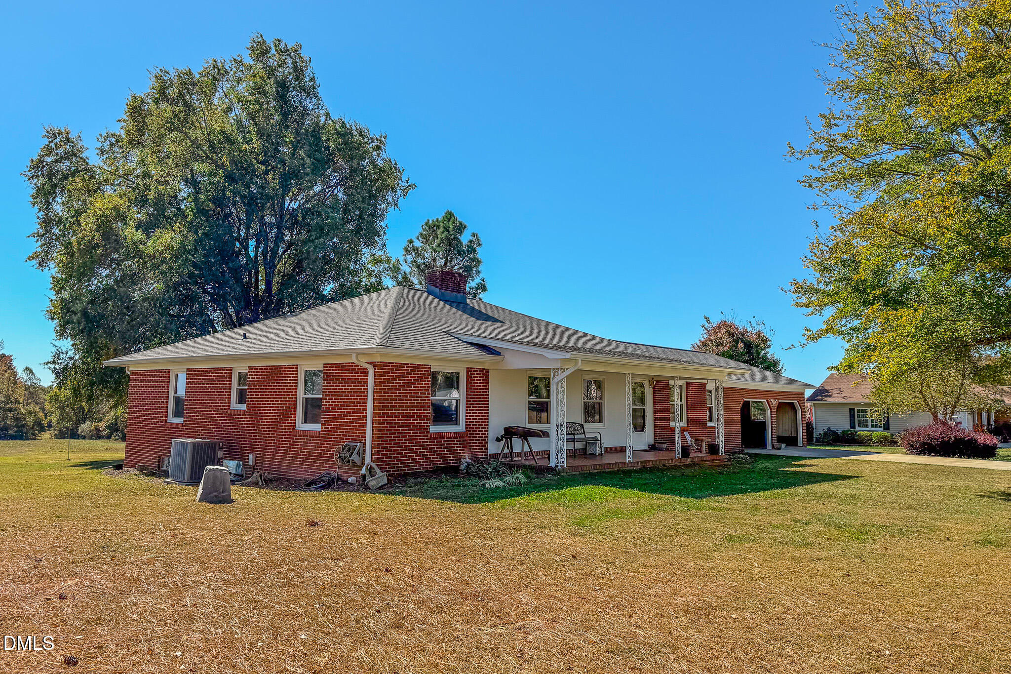 12057 Hurdle Mills Road Hurdle Mills, NC 27541 - Photo 44 of 52 a view of a house with a yard