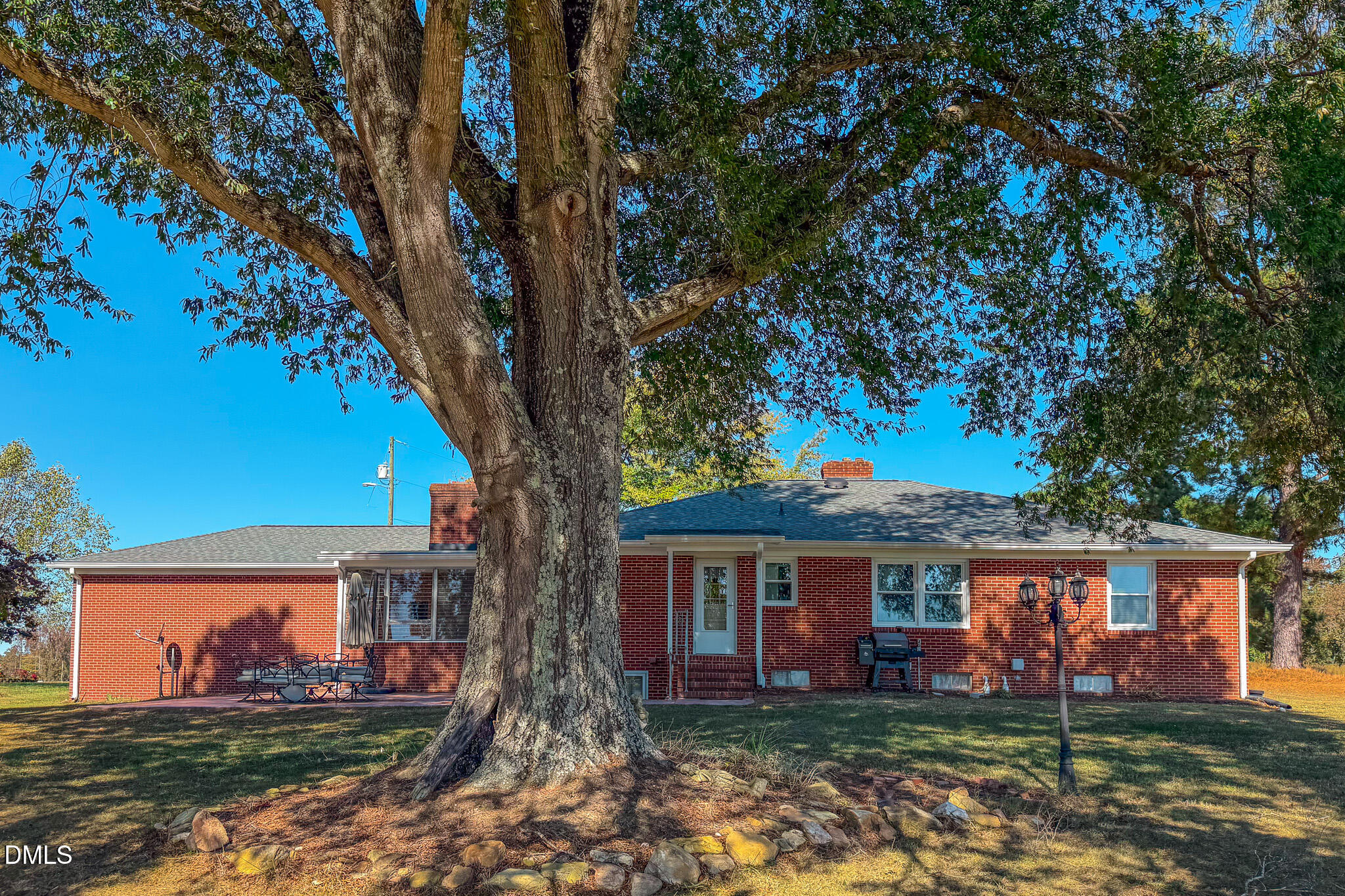 12057 Hurdle Mills Road Hurdle Mills, NC 27541 - Photo 52 of 52 front view of a house with a yard