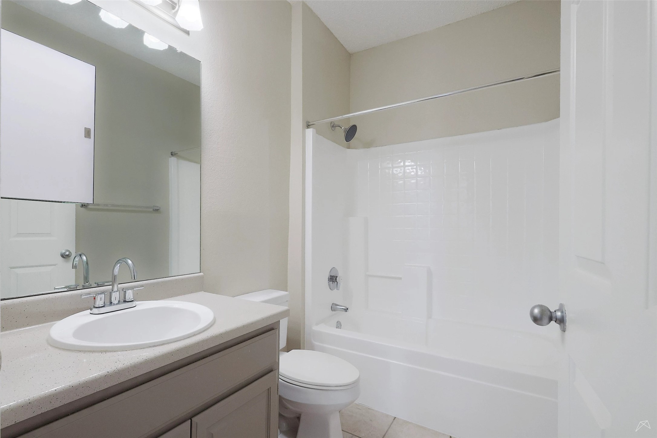 11908 Anderson Mill Road, Unit 321 Cedar Park, TX 78613 - Photo 21 of 24 a bathroom with a sink toilet and shower