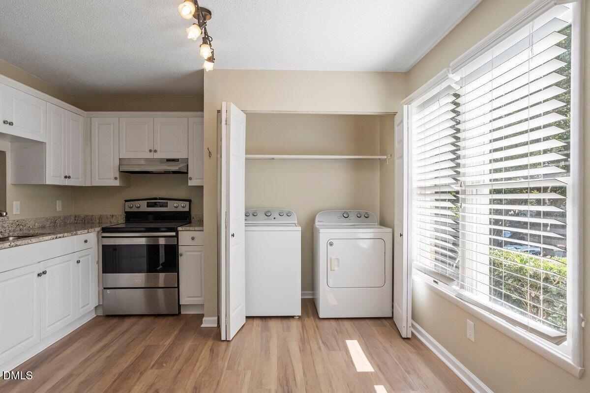 7733 Ohmann Court Raleigh, NC 27615 - Photo 7 of 27