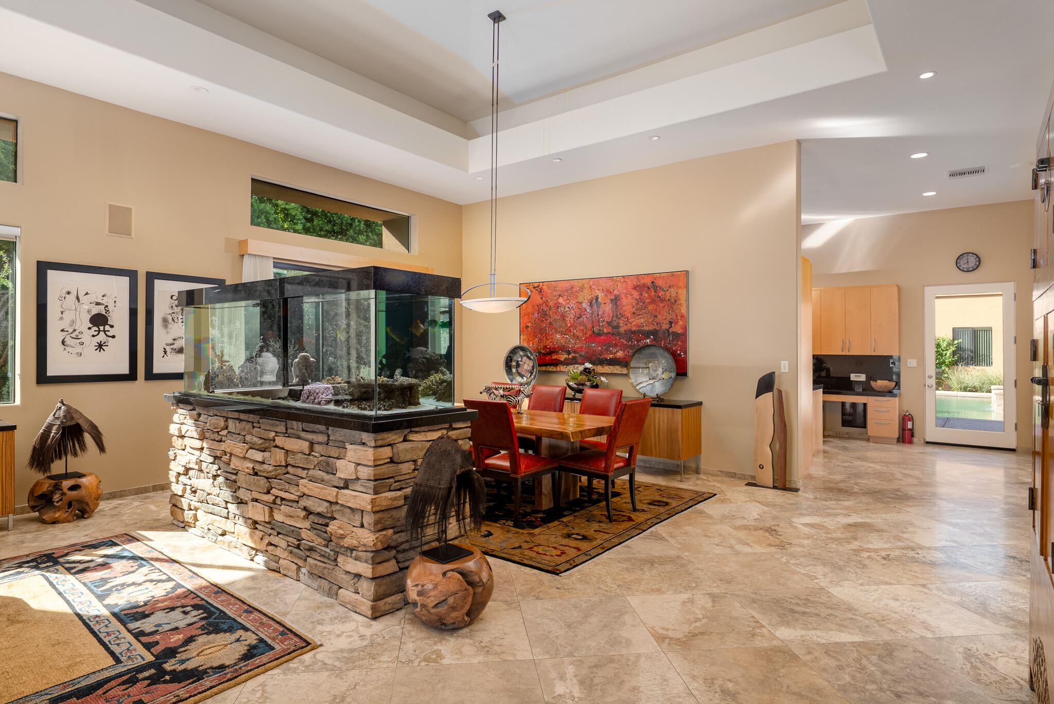 72116 Clancy Lane Rancho Mirage, CA 92270 - Photo 12 of 59 a room with lots of chairs and mirrors