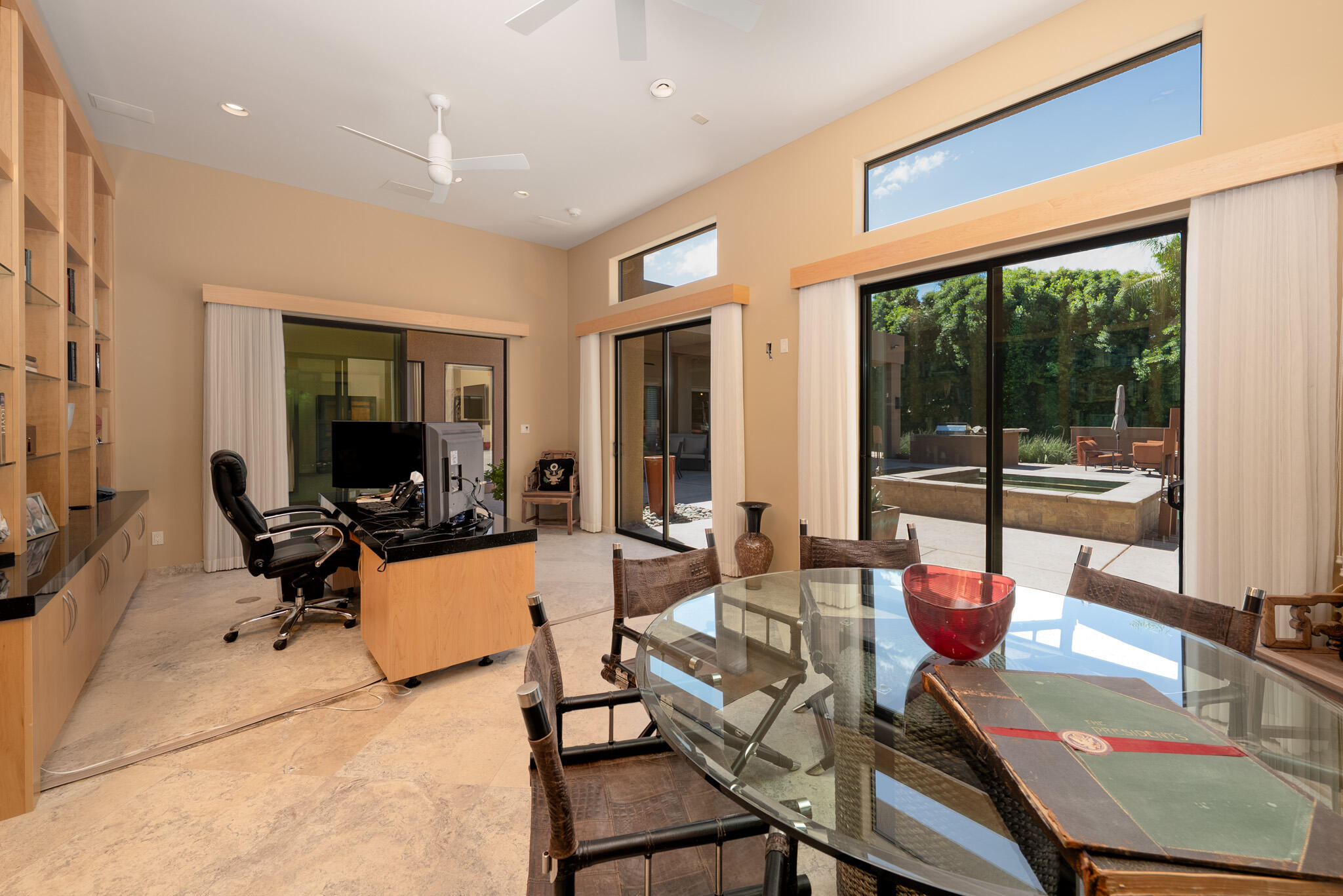 72116 Clancy Lane Rancho Mirage, CA 92270 - Photo 32 of 59 a living room with furniture and a large window