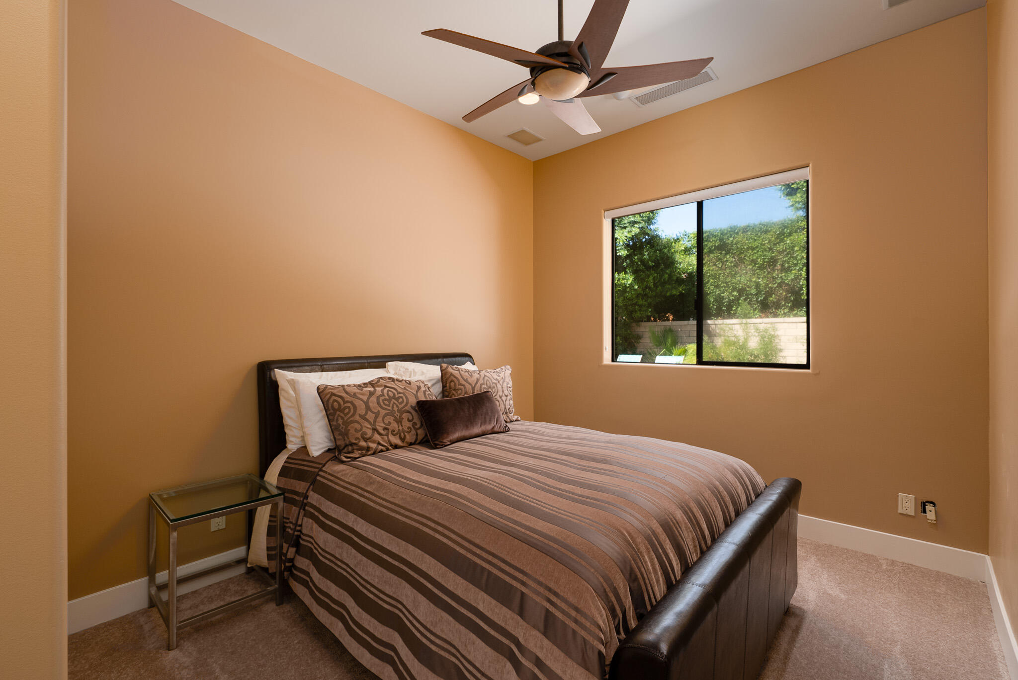 72116 Clancy Lane Rancho Mirage, CA 92270 - Photo 37 of 59 a bedroom with a bed and a window