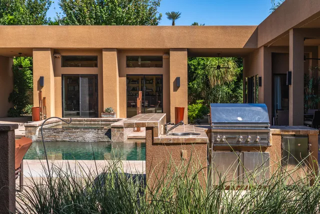 a view of a back yard of the house