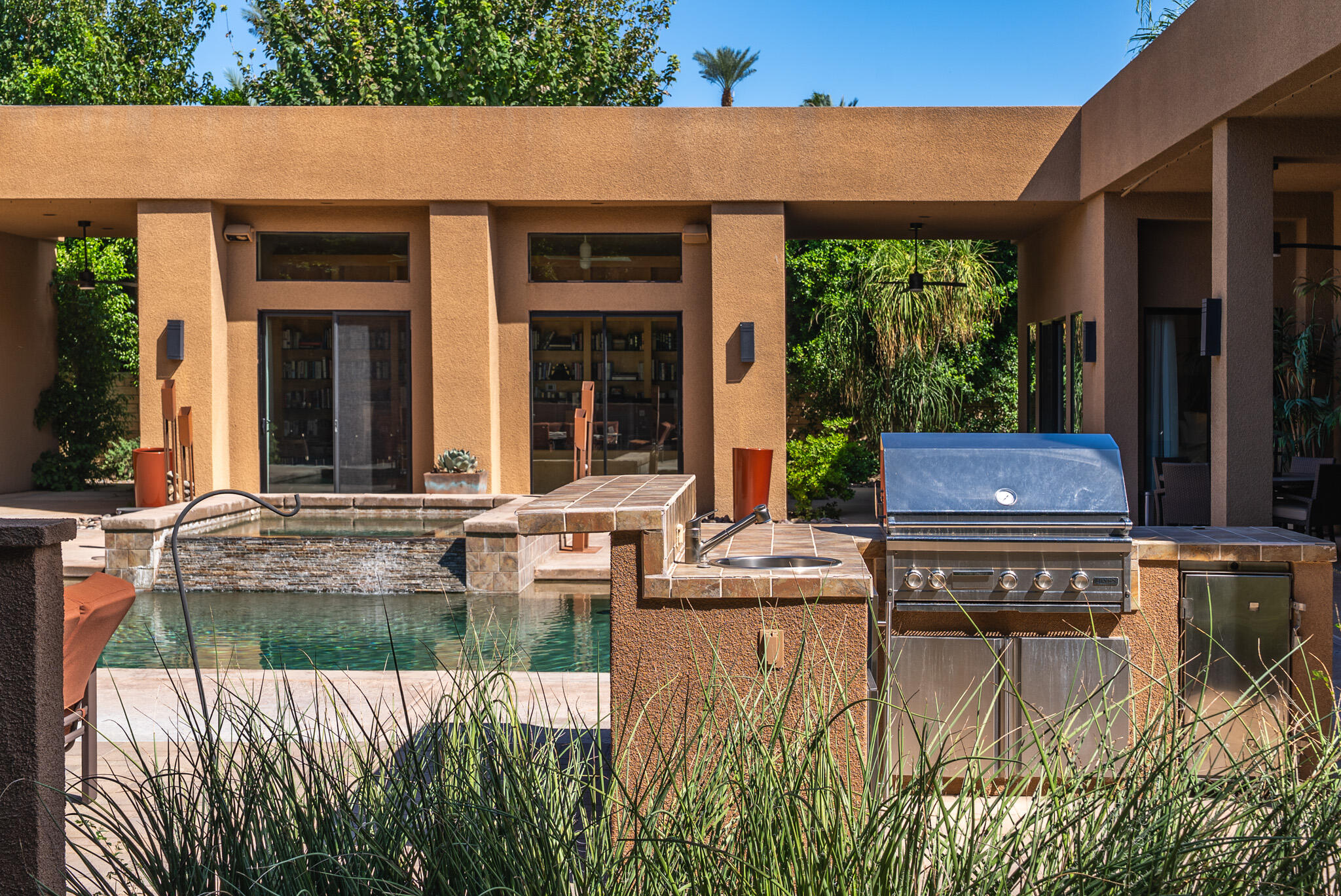 72116 Clancy Lane Rancho Mirage, CA 92270 - Photo 42 of 59 a swimming pool with outdoor seating and yard