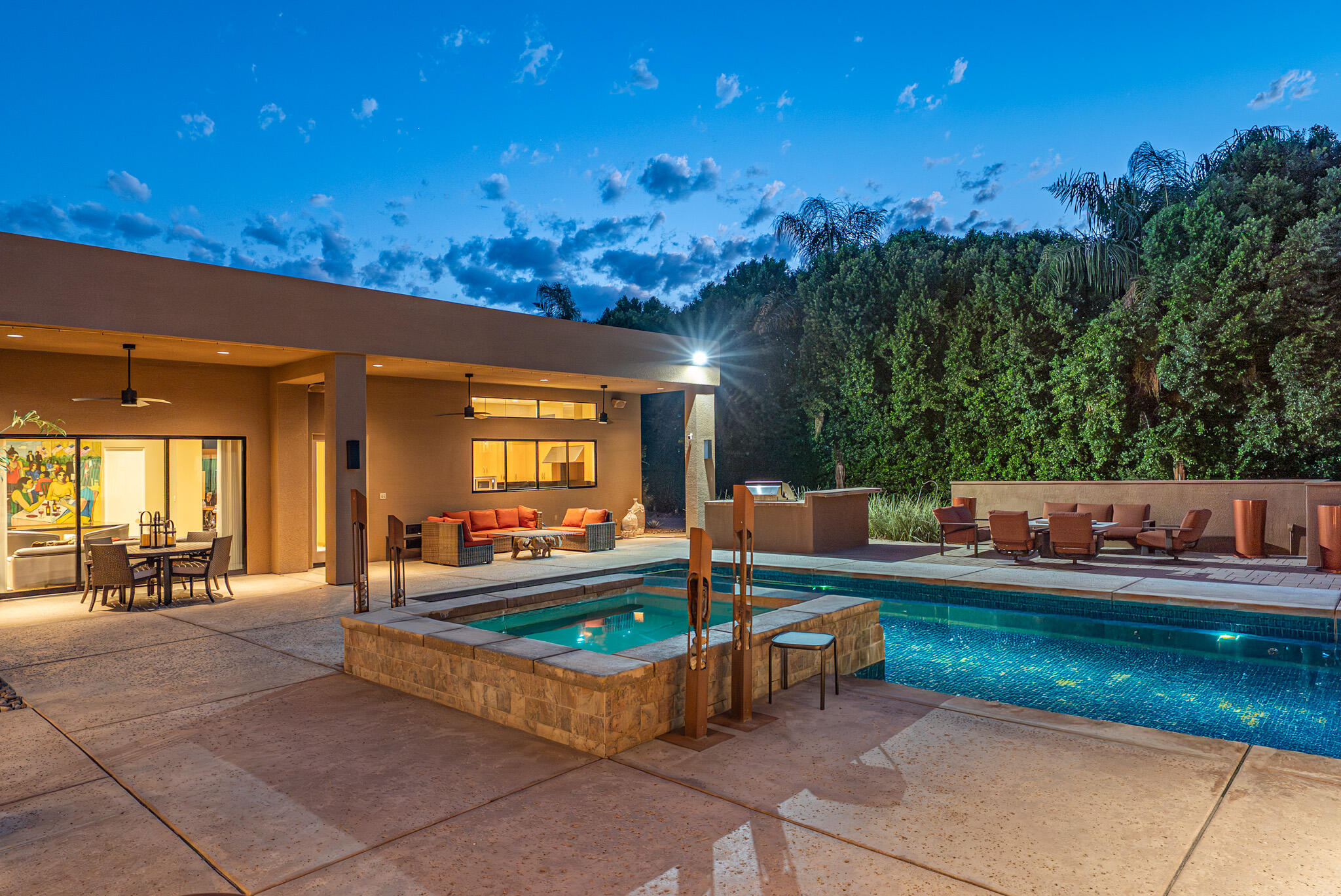 72116 Clancy Lane Rancho Mirage, CA 92270 - Photo 56 of 59 a view of a patio with couches table and chairs with wooden fence