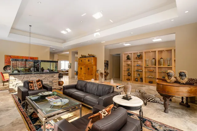 a living room with furniture and a table