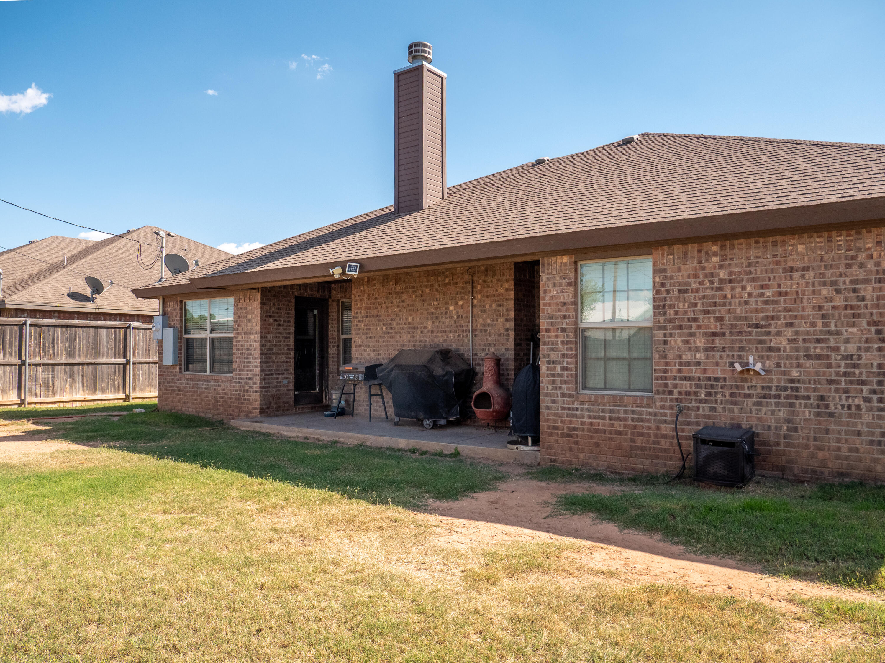 910 12th Street Wolfforth, TX 79382 - Photo 12 of 18 a front view of a house with garden