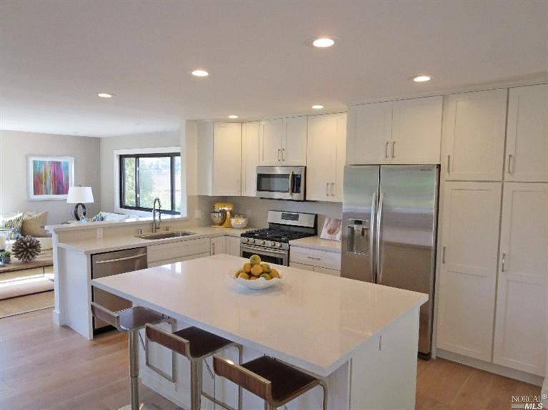 8 Tralee Way San Rafael, CA 94903 - Photo 1 of 1 a kitchen with a sink a counter top stainless steel appliances and cabinets