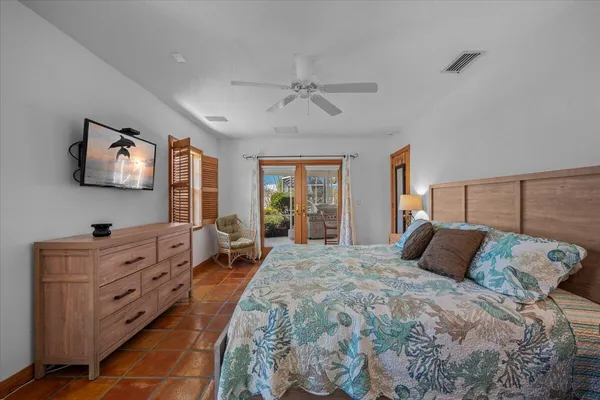a view of a patio with a table and chairs