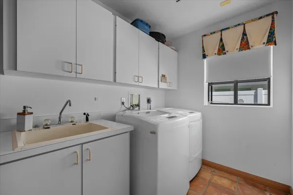 a view of a hallway with windows