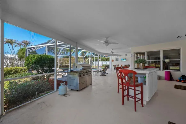a living room with furniture and a garage