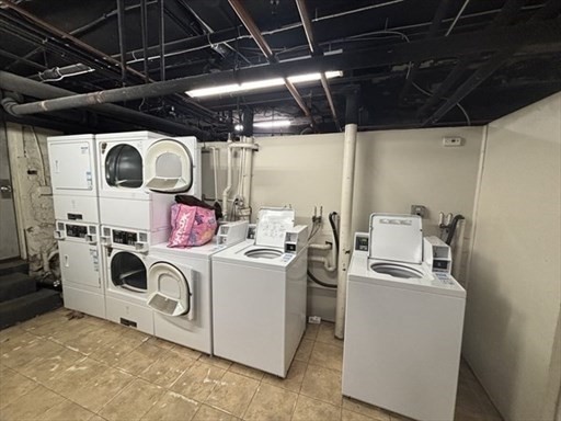 70 Strathmore Road, Unit 9B Boston, MA 02135 - Photo 18 of 19 a utility room with dryer and washer