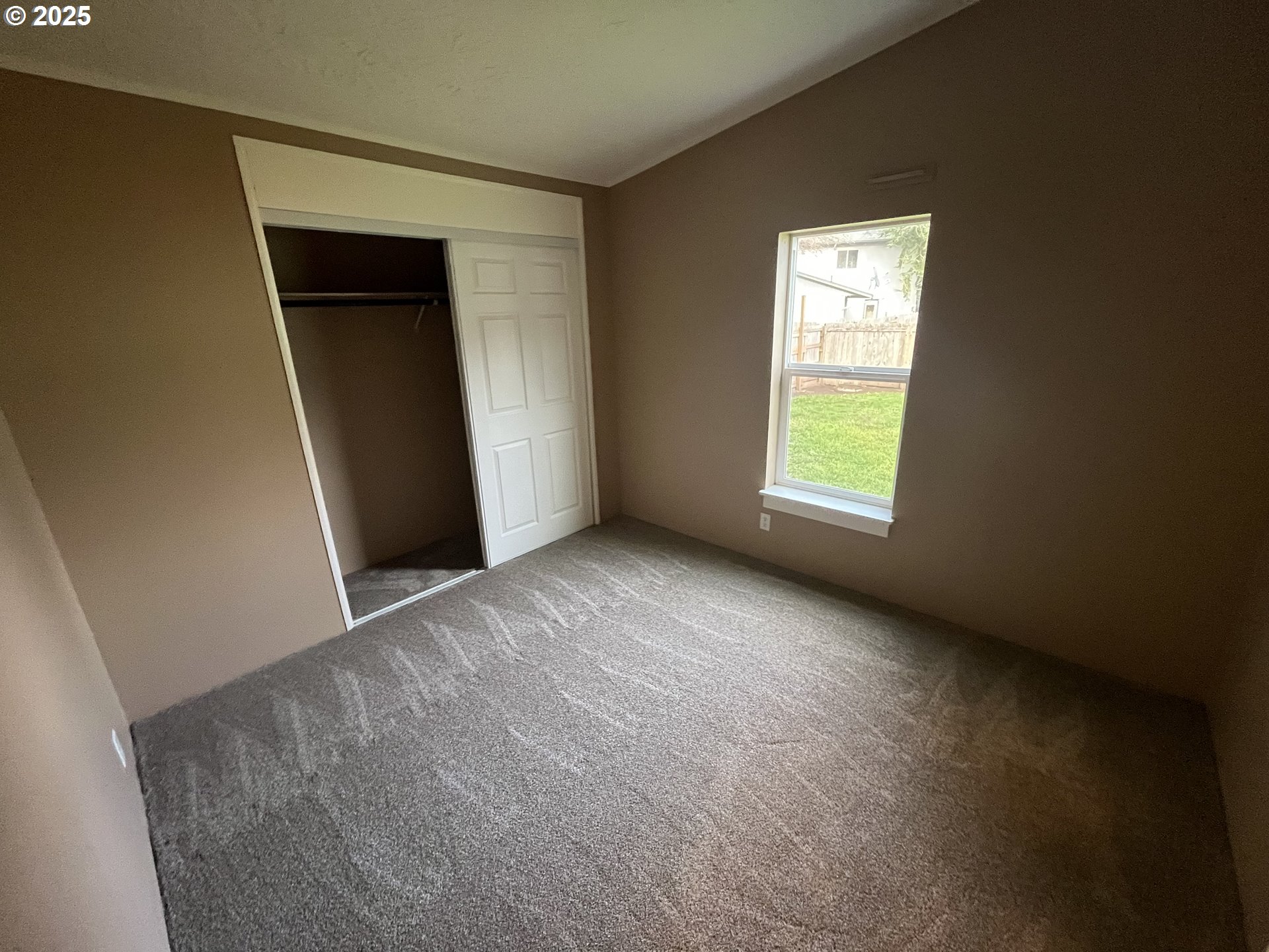 7032 Main Street Springfield, OR 97478 - Photo 17 of 17 a view of an empty room with a window