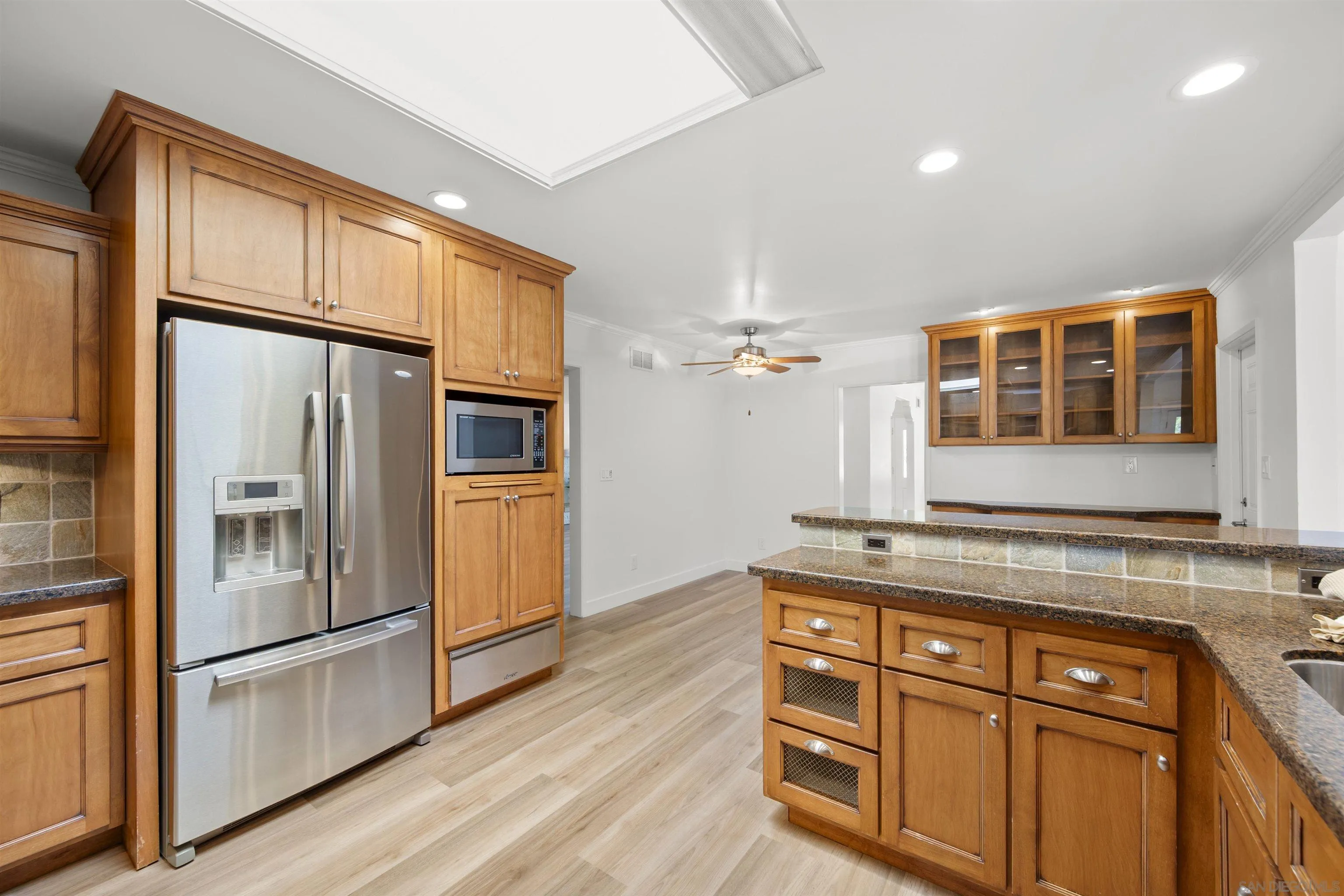 1835 Westward Ho Circle El Cajon, CA 92021 - Photo 21 of 57 a kitchen with stainless steel appliances granite countertop a refrigerator and a stove