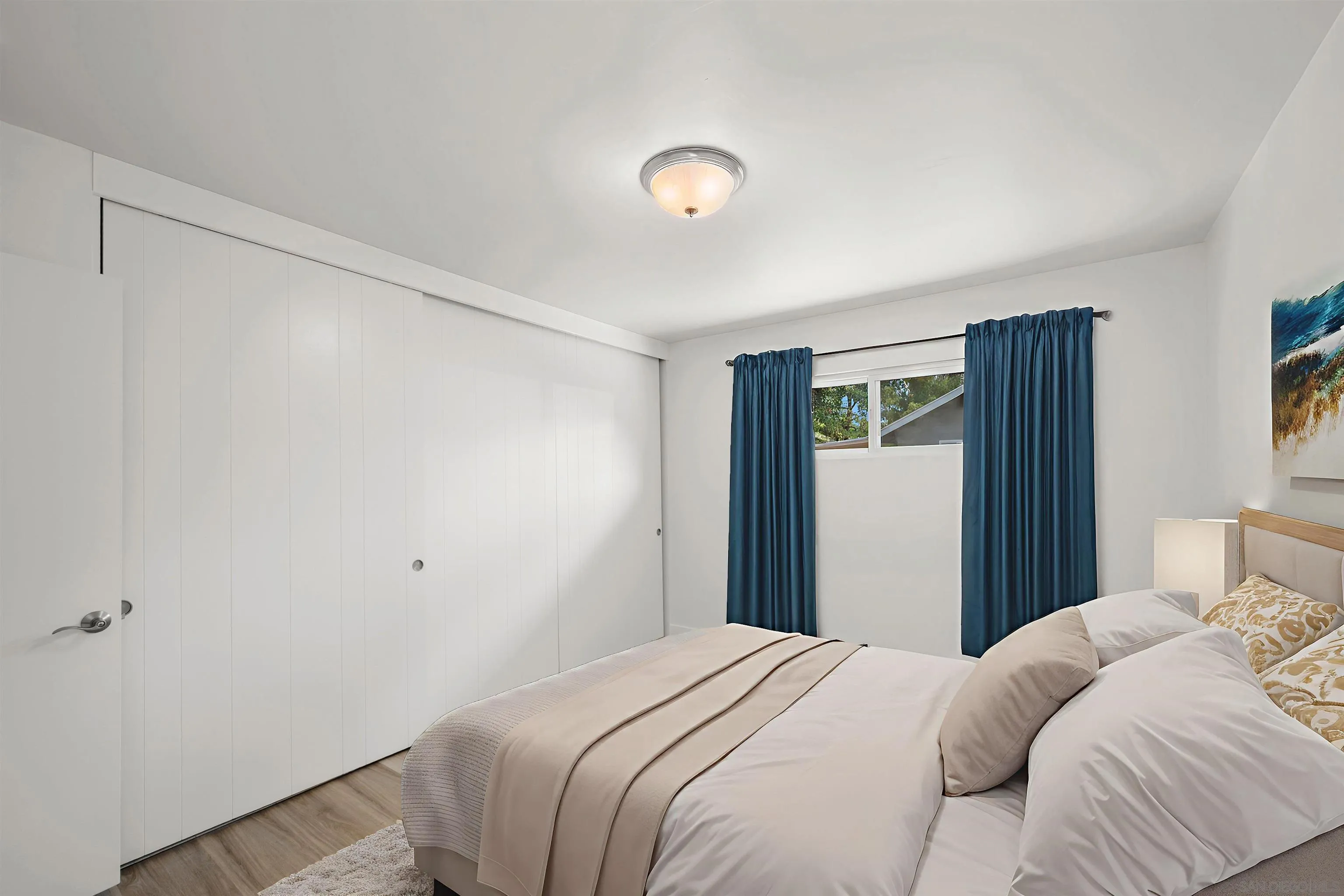 1835 Westward Ho Circle El Cajon, CA 92021 - Photo 28 of 57 a bedroom with a bed and a window