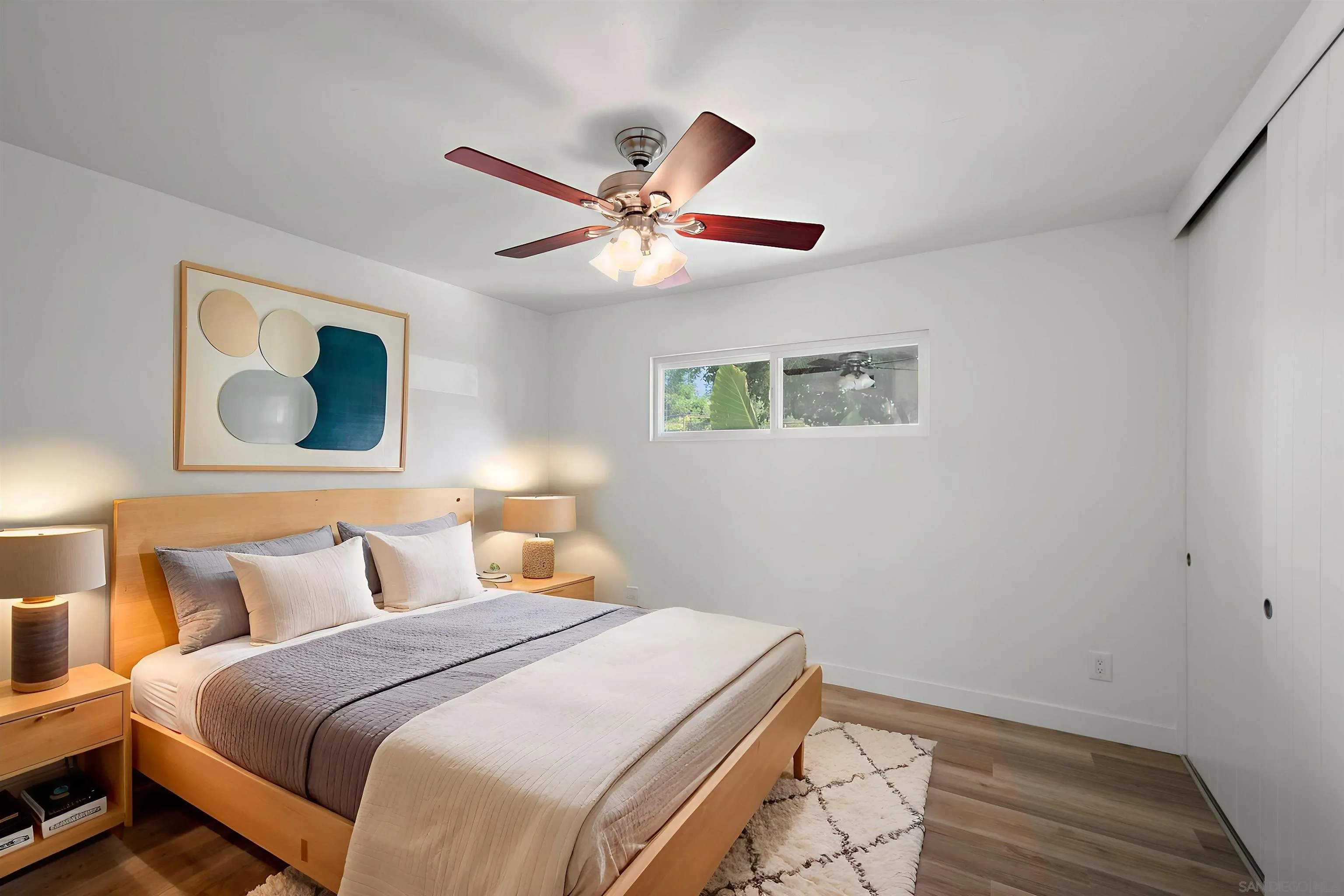 1835 Westward Ho Circle El Cajon, CA 92021 - Photo 32 of 57 a bedroom with a bed and a painting on the wall