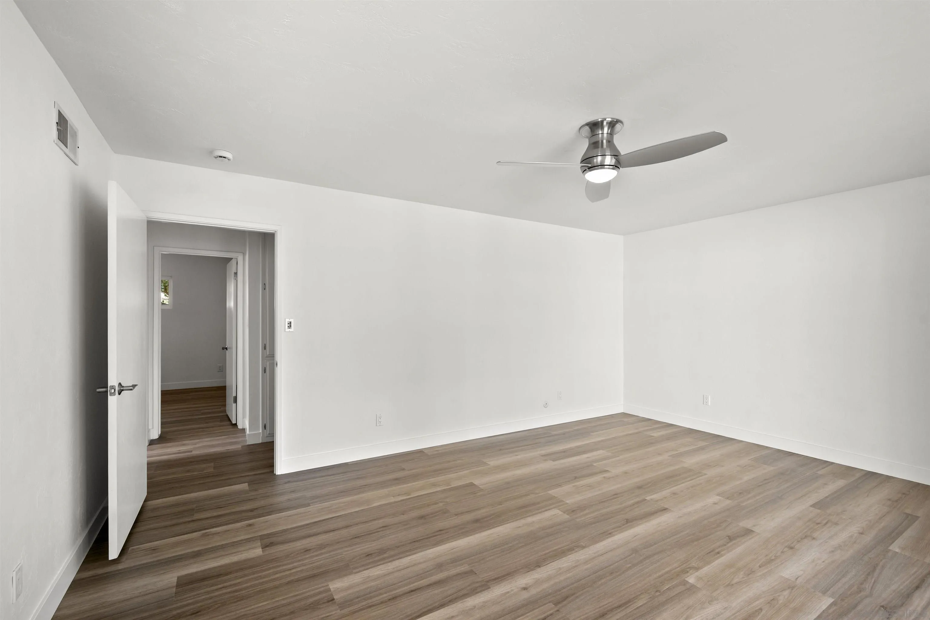 1835 Westward Ho Circle El Cajon, CA 92021 - Photo 33 of 57 wooden floor in an empty room with a window