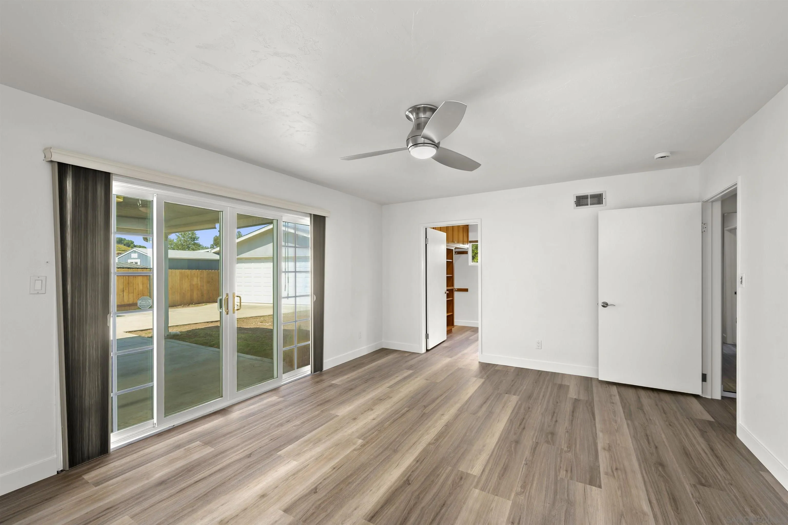 1835 Westward Ho Circle El Cajon, CA 92021 - Photo 34 of 57 a view of empty room with wooden floor and fan