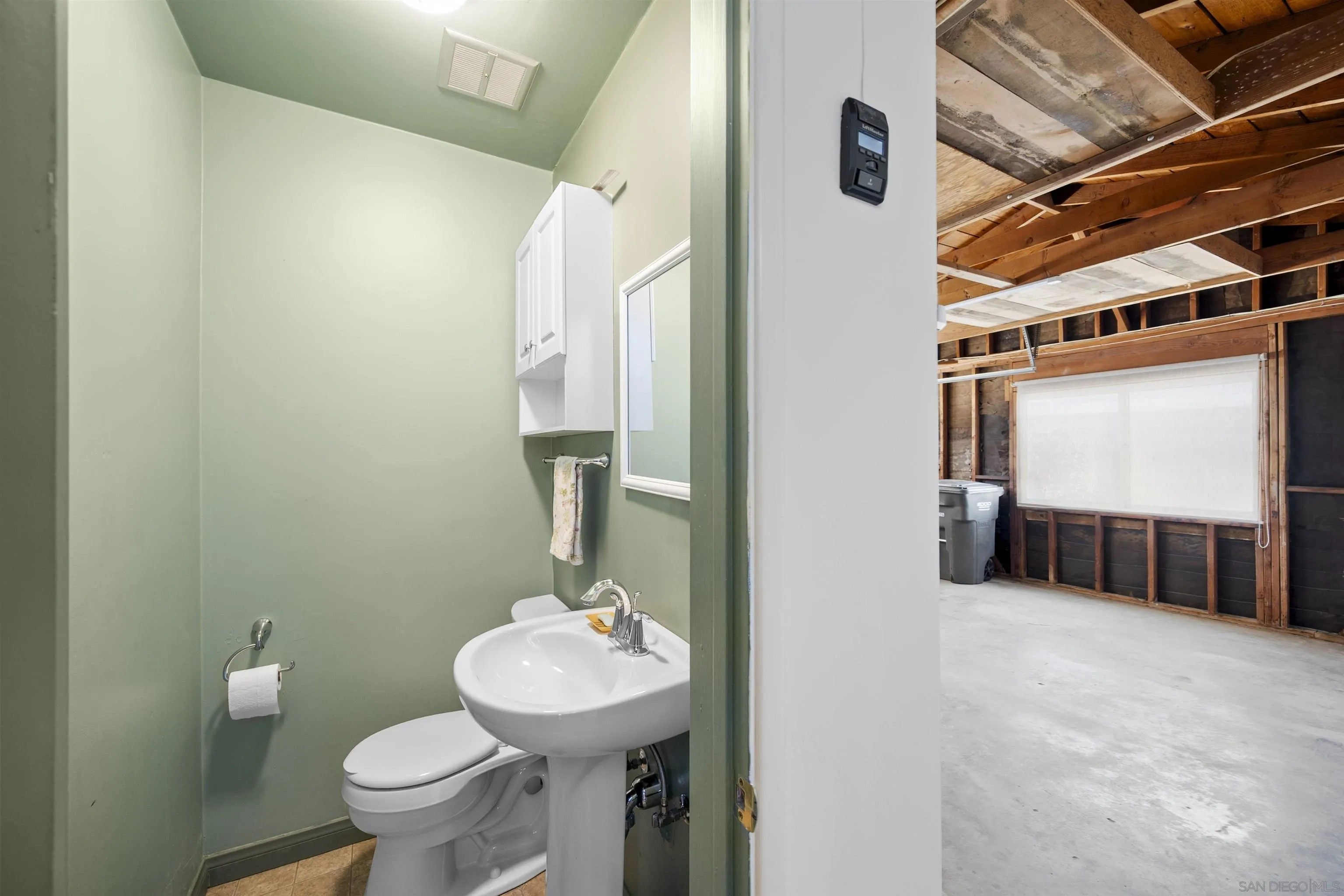1835 Westward Ho Circle El Cajon, CA 92021 - Photo 41 of 57 a bathroom with a sink and a mirror