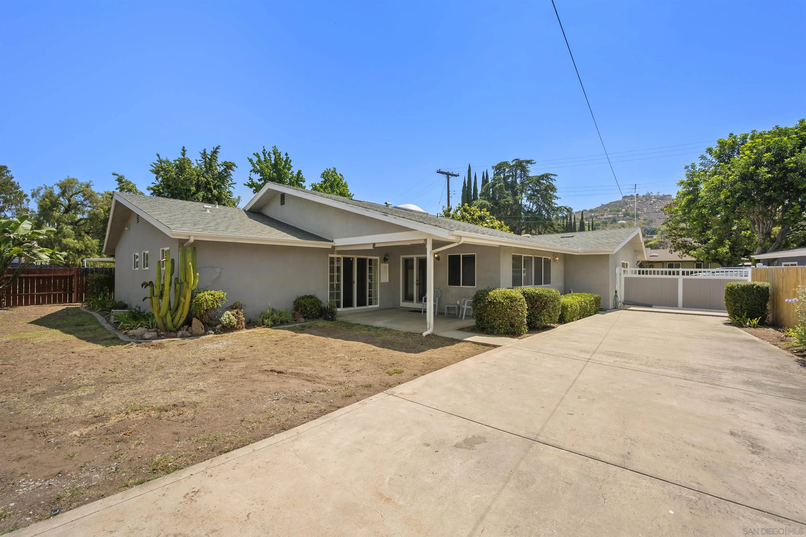 1835 Westward Ho Circle El Cajon, CA 92021 - Photo 46 of 57 a front view of a house with a yard