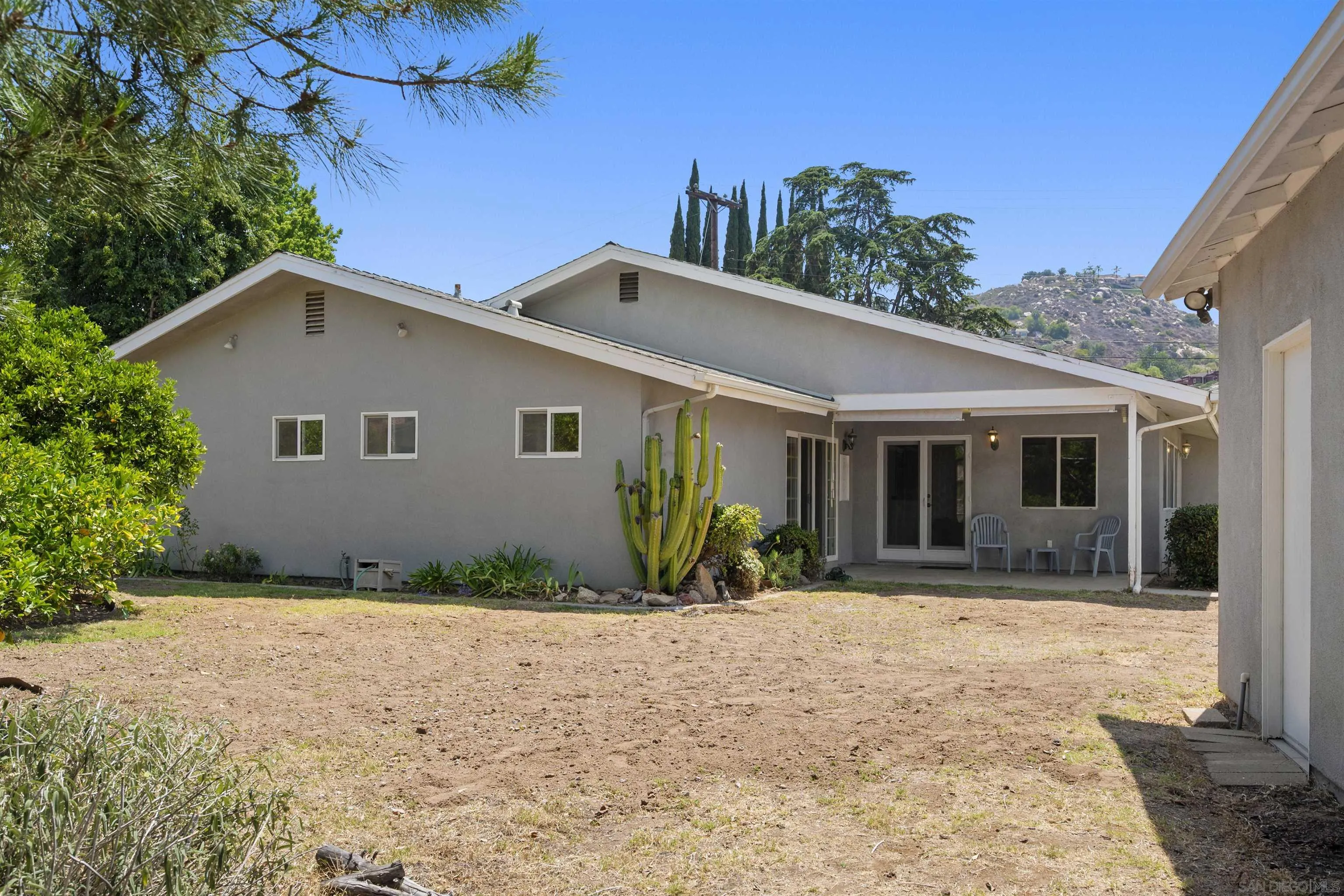 1835 Westward Ho Circle El Cajon, CA 92021 - Photo 49 of 57 a front view of a house with a yard