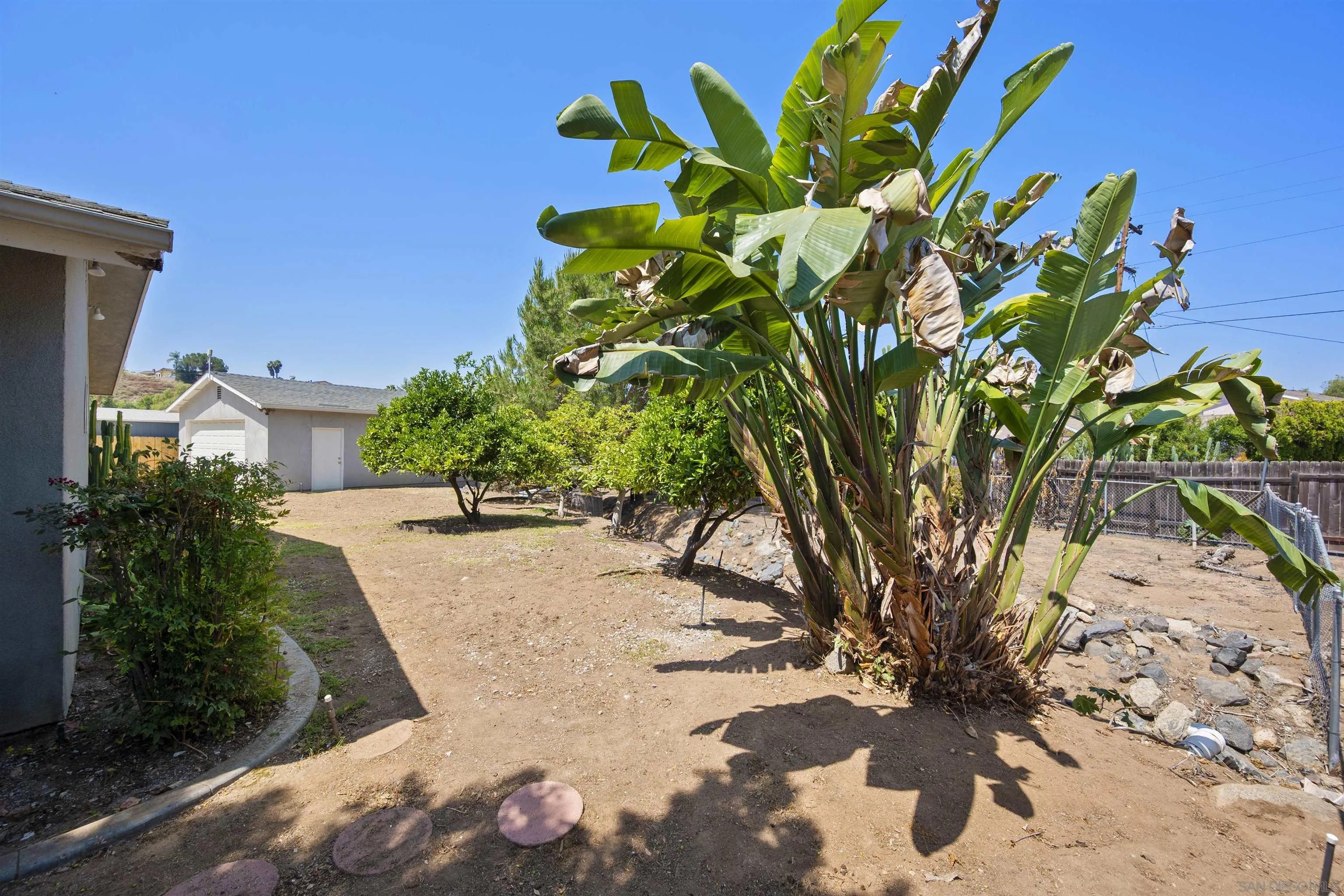 1835 Westward Ho Circle El Cajon, CA 92021 - Photo 50 of 57 a view of a yard with a tree