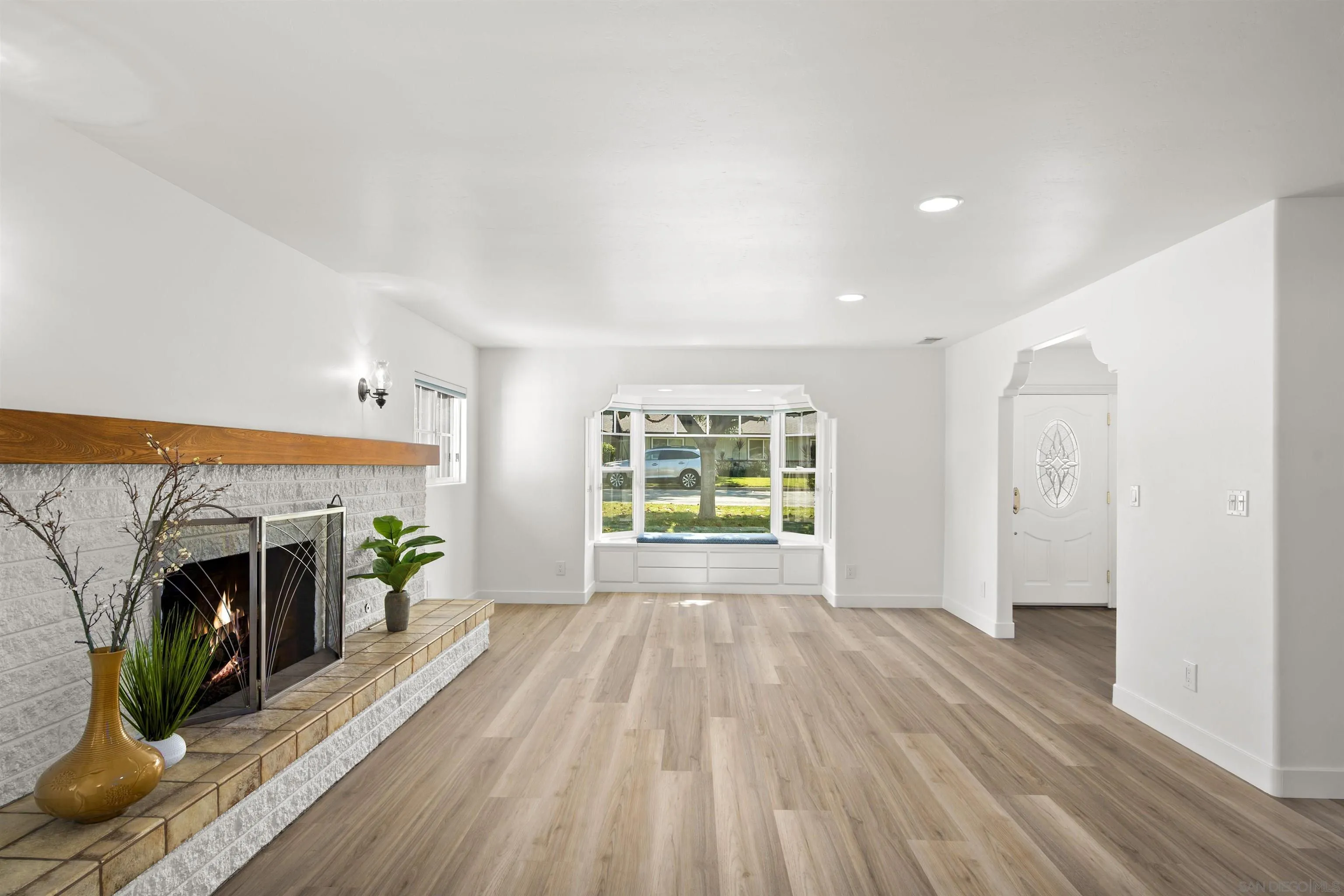 1835 Westward Ho Circle El Cajon, CA 92021 - Photo 6 of 57 a view of empty room with wooden floor and fireplace