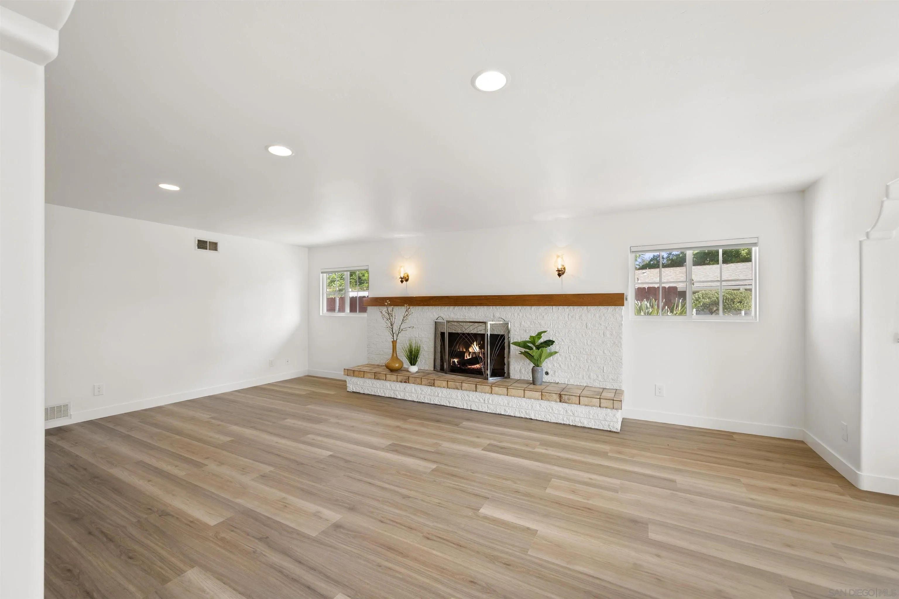 1835 Westward Ho Circle El Cajon, CA 92021 - Photo 9 of 57 a view of an empty room with a fireplace and a window
