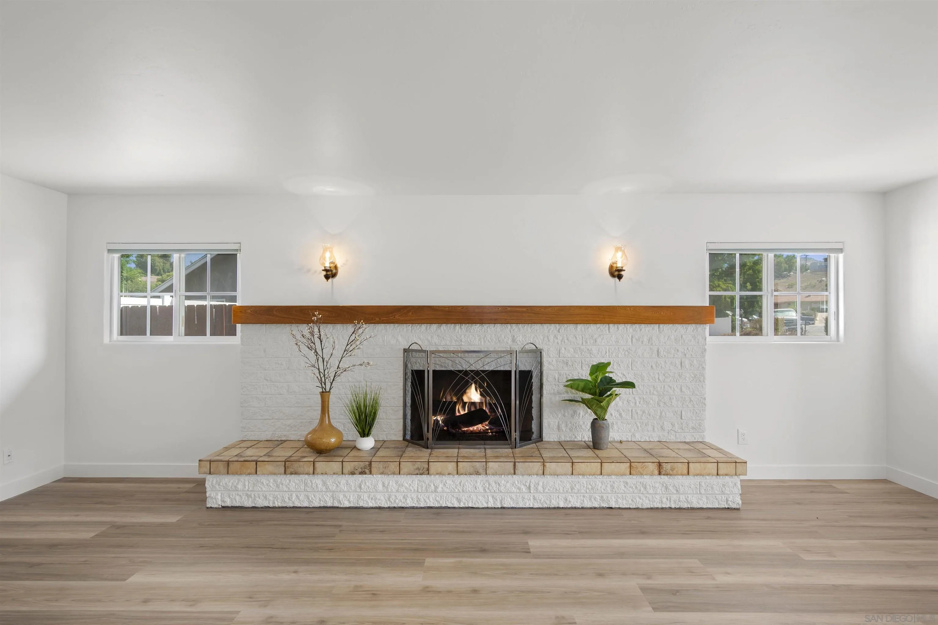 1835 Westward Ho Circle El Cajon, CA 92021 - Photo 10 of 57 a living room with furniture and a fireplace