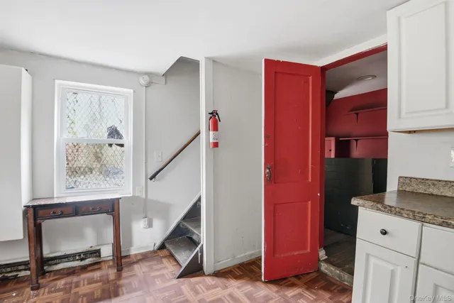 a view of livingroom with furniture and stairs