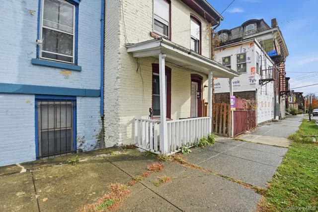 a front view of a house with a garage