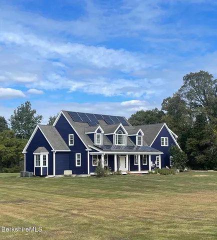 a front view of house with yard