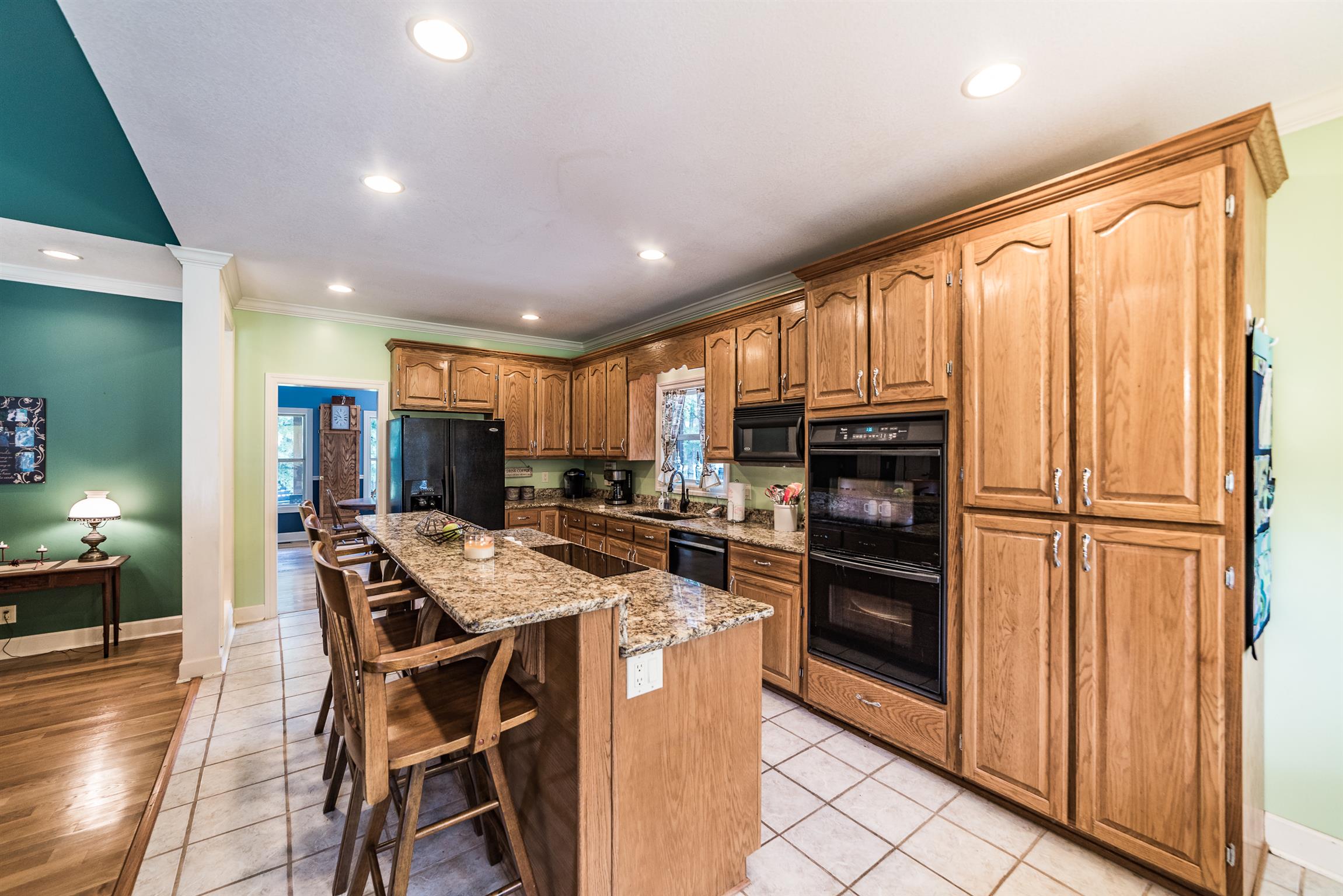 41 Pepper Road Taft, TN 38488 - Photo 8 of 30 a kitchen with stainless steel appliances granite countertop a refrigerator and a stove top oven