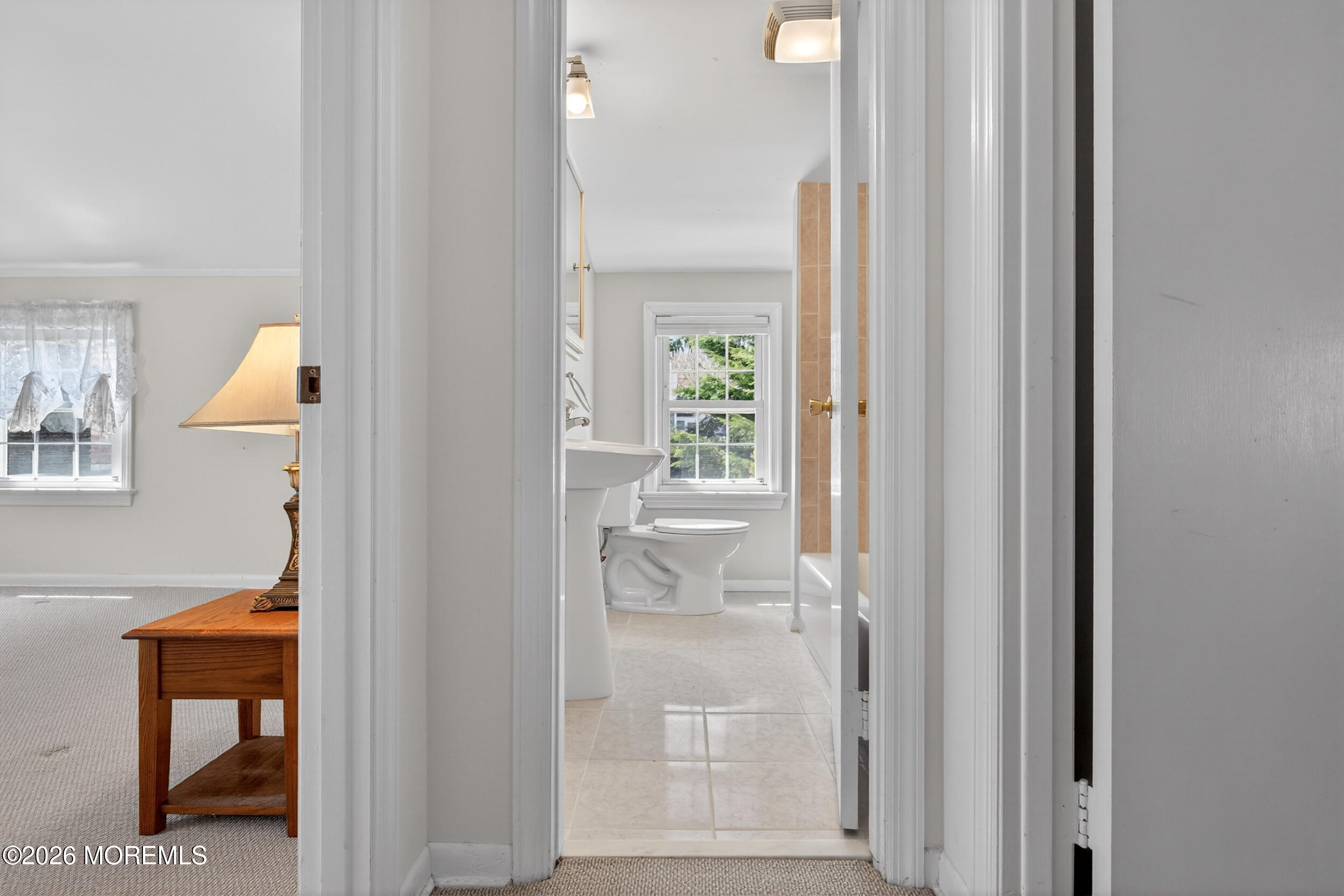 68 Davis Lane Red Bank, NJ 07701 - Photo 14 of 41 hallway with wooden floor and windows