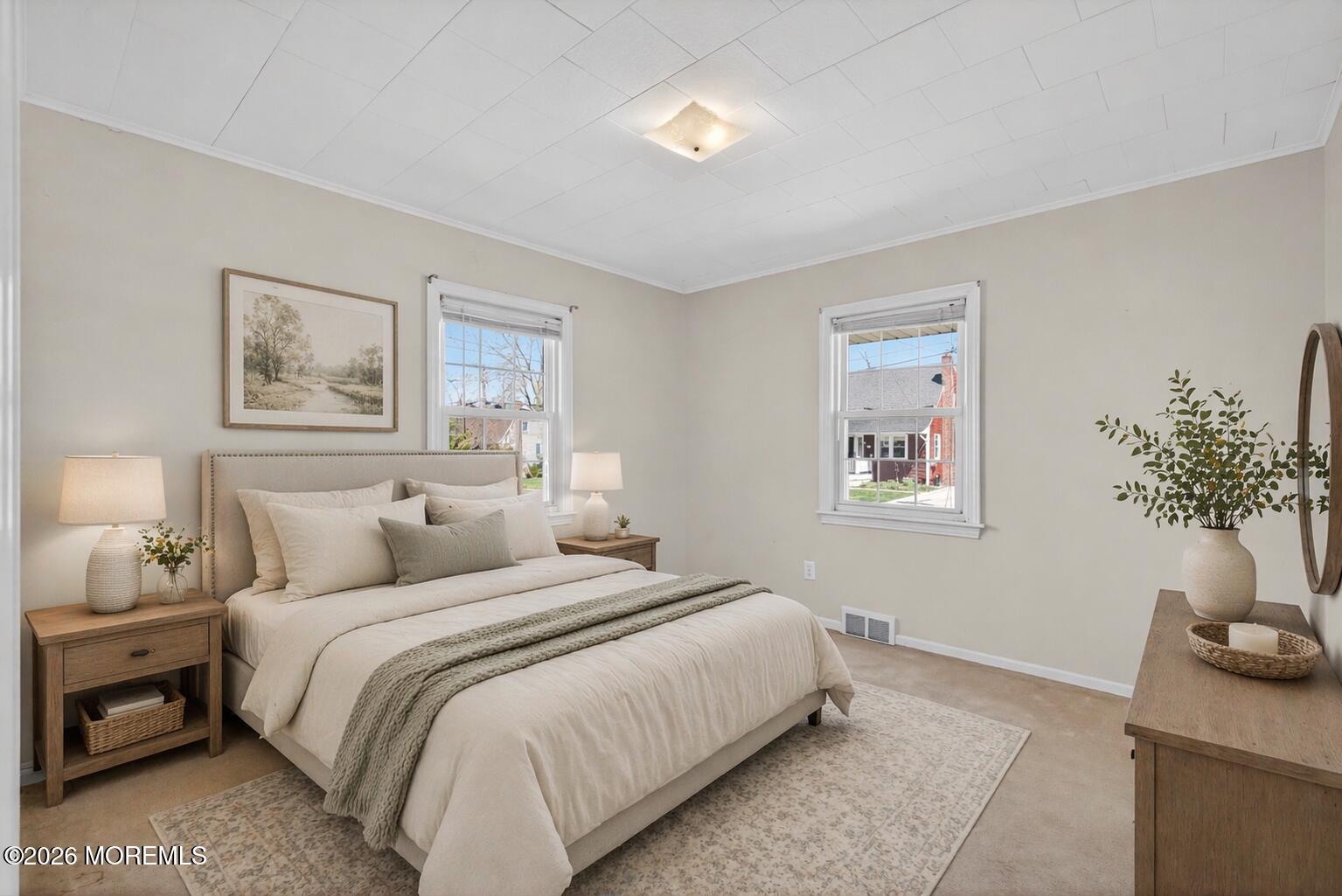 68 Davis Lane Red Bank, NJ 07701 - Photo 19 of 41 a bedroom with bed and painting on the wall
