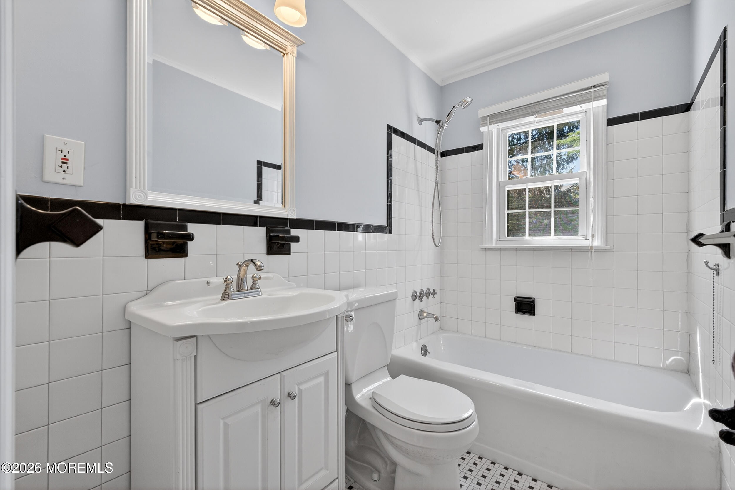 68 Davis Lane Red Bank, NJ 07701 - Photo 21 of 41 a bathroom with a sink toilet a mirror and shower