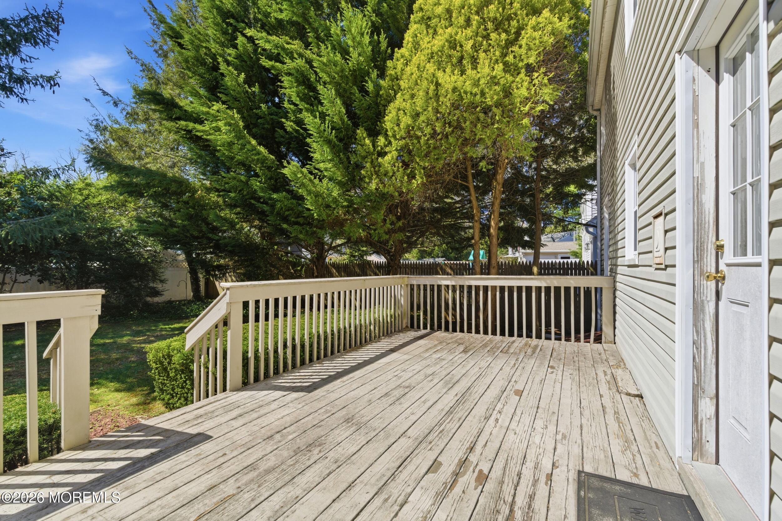 68 Davis Lane Red Bank, NJ 07701 - Photo 25 of 41 a view of balcony with wooden floor and fence