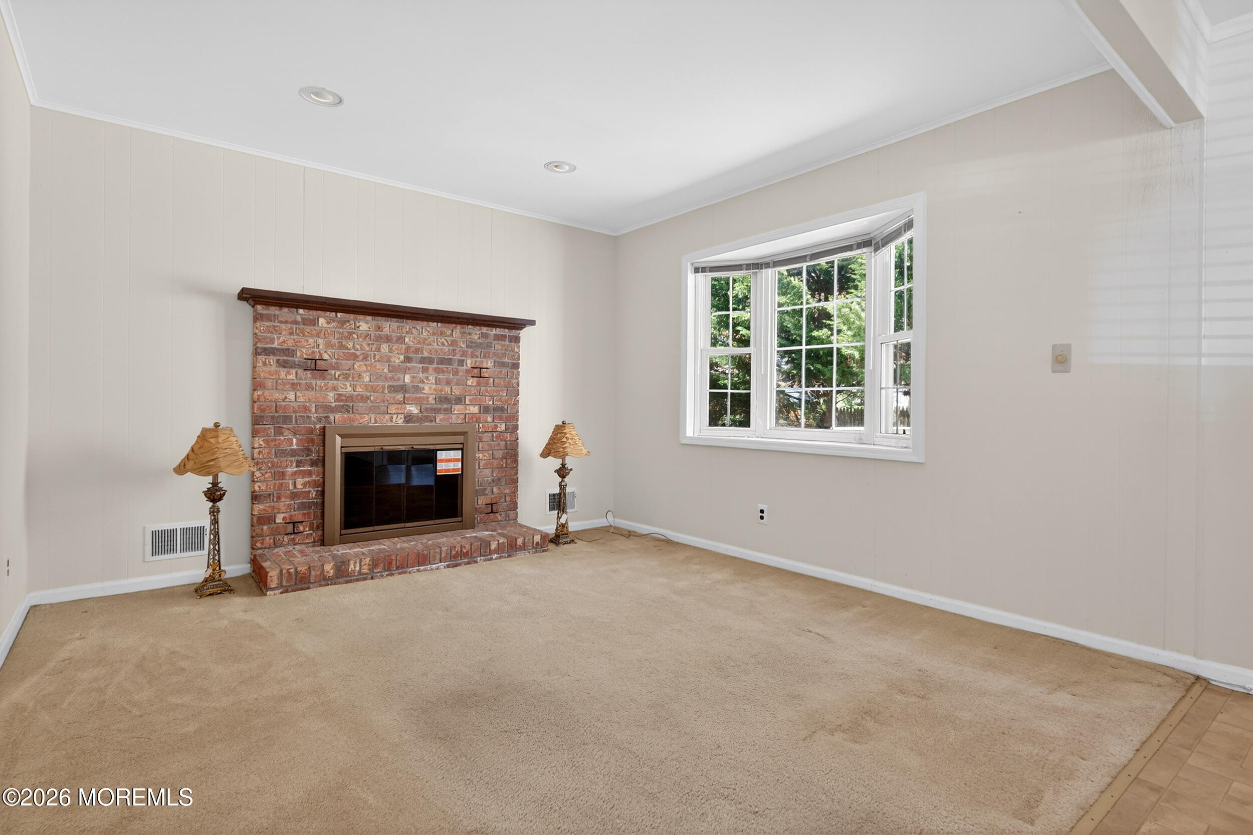 68 Davis Lane Red Bank, NJ 07701 - Photo 7 of 41 a view of an empty room with a window