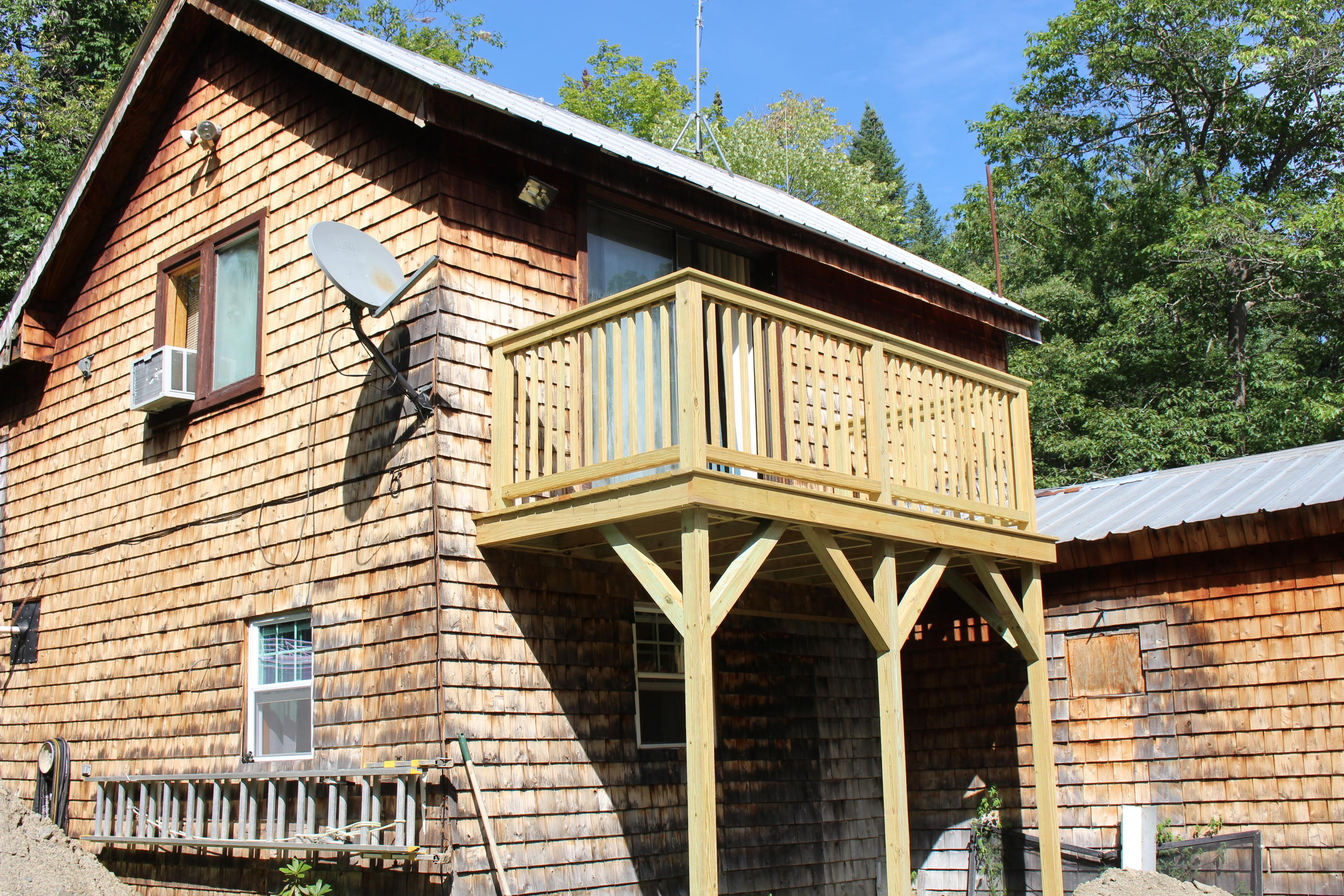 167 Pease Bridge Road Abbot, ME 04406 - Photo 10 of 18 Deck off the Master Bedroom