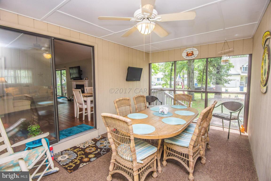 56 Pinehurst Road Ocean Pines, MD 21811 - Photo 42 of 42 a view of a dining room with furniture window and outside view
