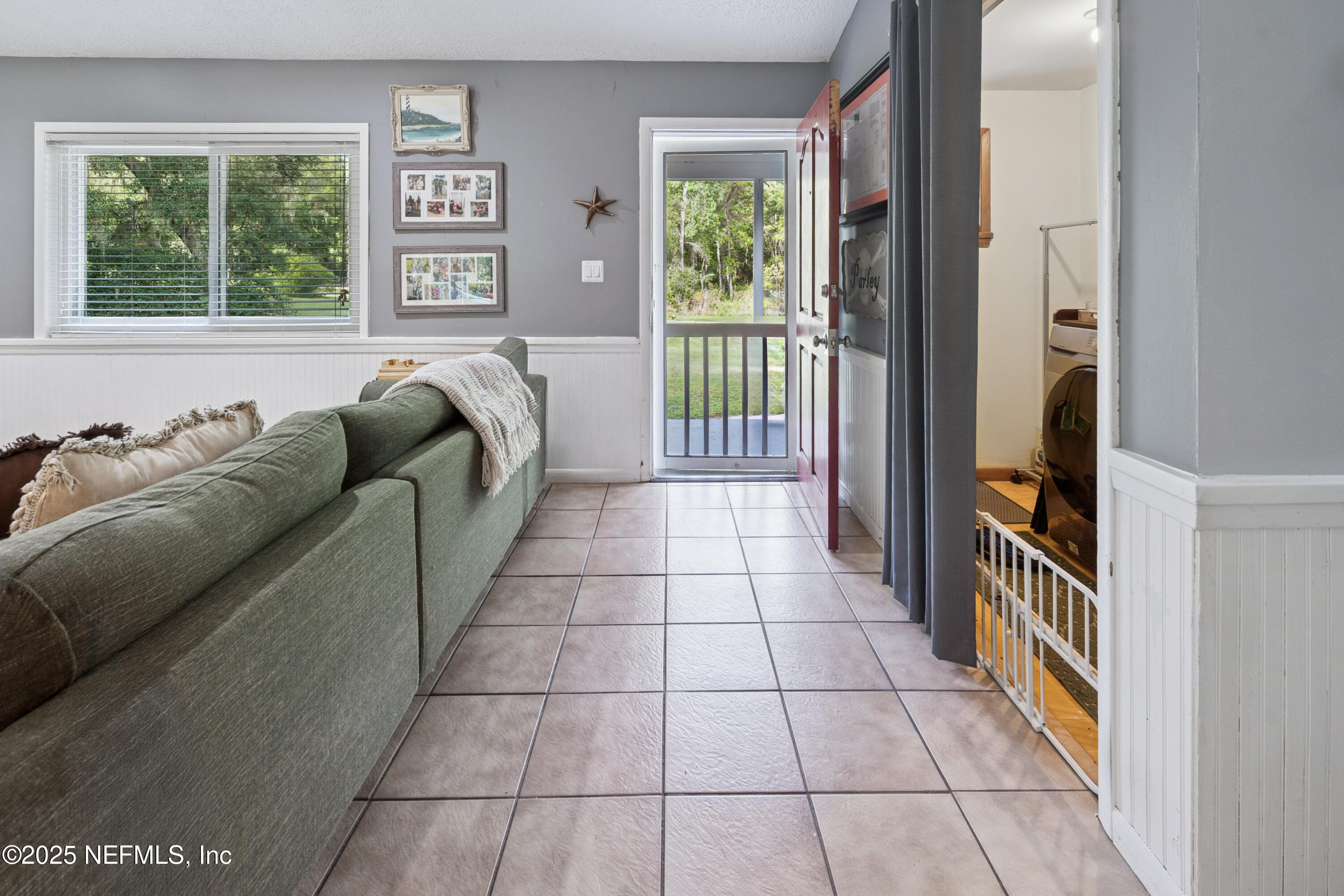 18311 Northeast 21 Street Gainesville, FL 32609 - Photo 13 of 80 a balcony with furniture