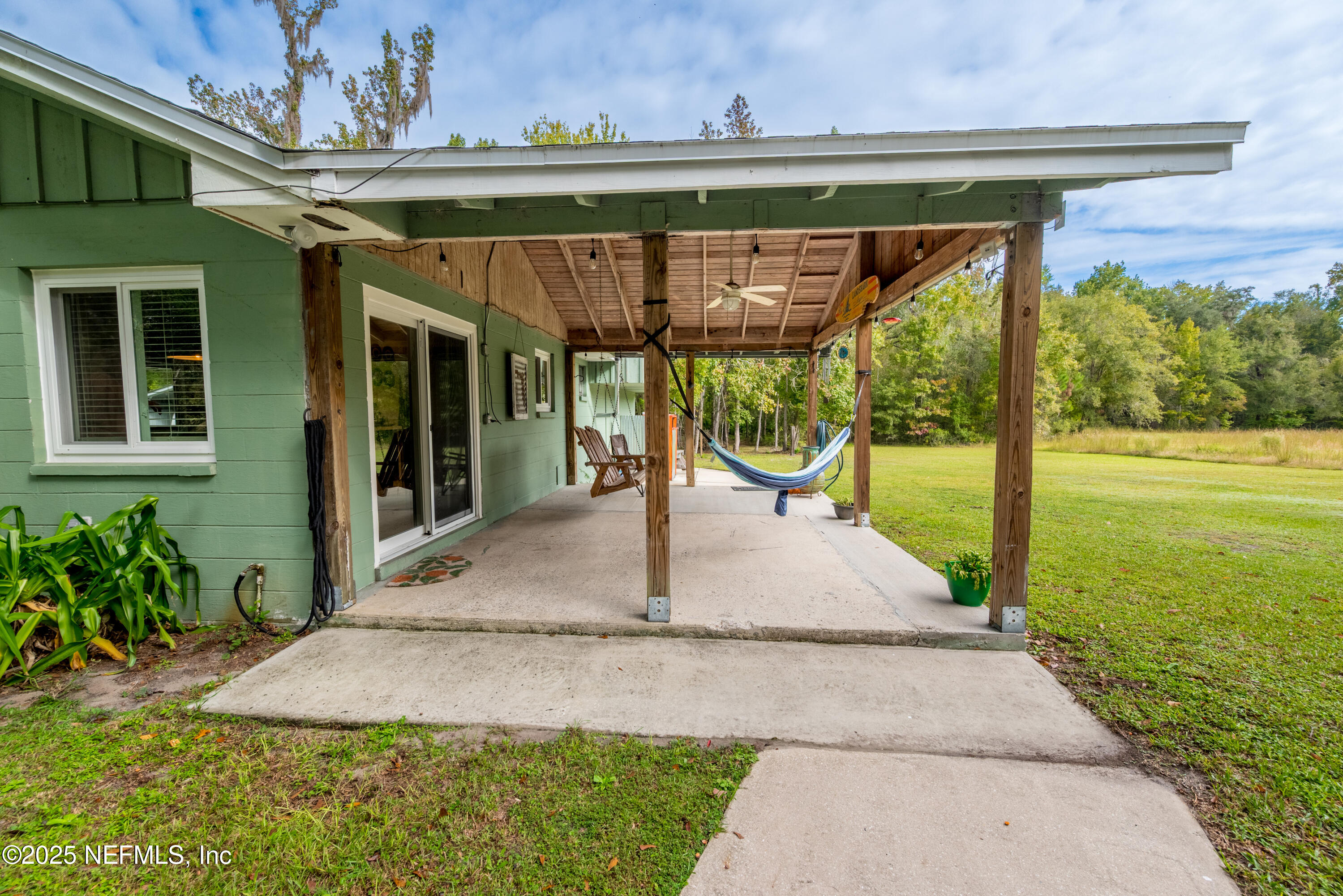 18311 Northeast 21 Street Gainesville, FL 32609 - Photo 55 of 80 a view of swimming pool with a patio