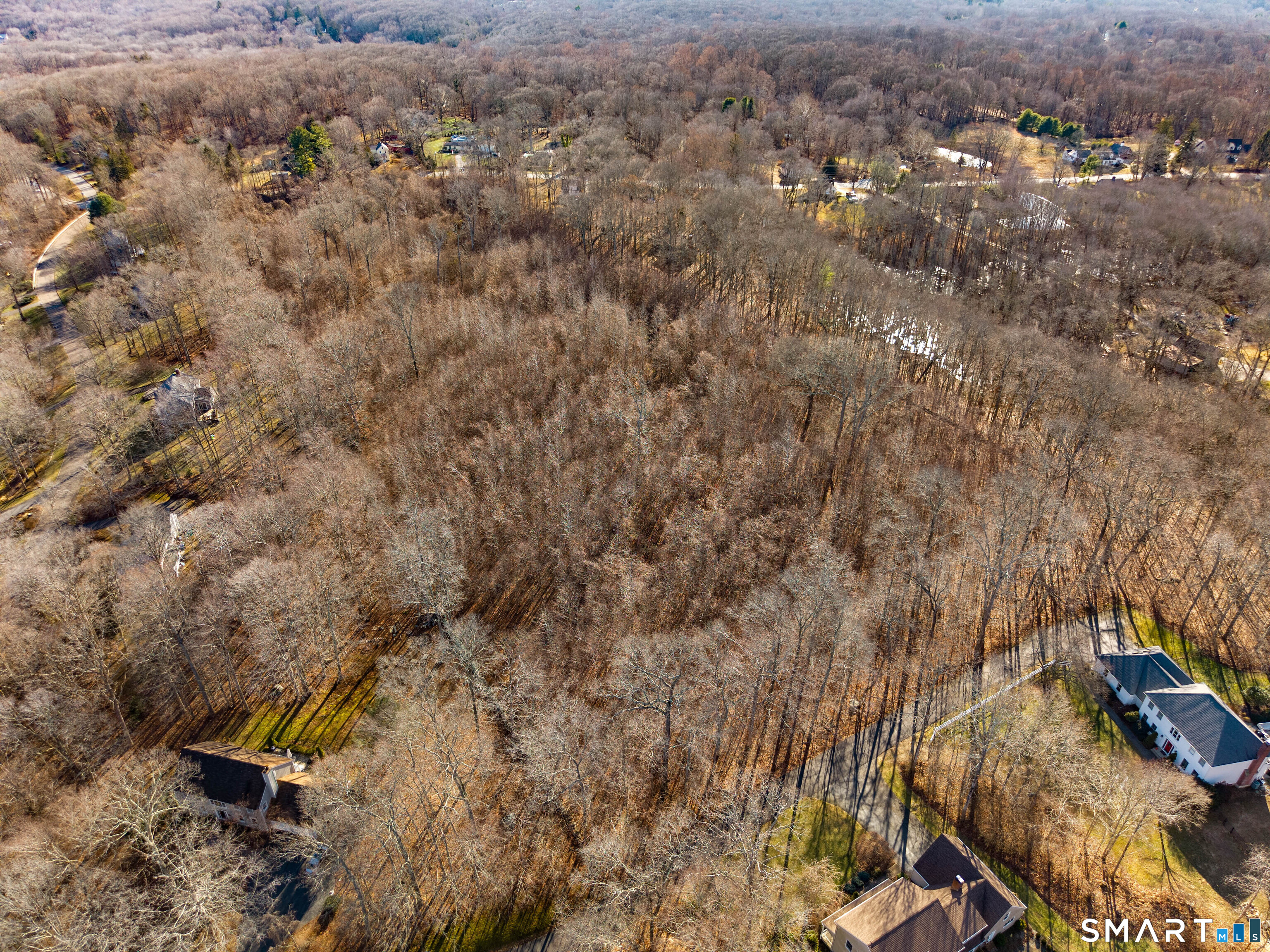 41 Bushy Hill Road Essex, CT 06442 - Photo 3 of 38 an aerial view of residential house with parking space