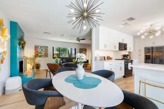 a living room with furniture and a table